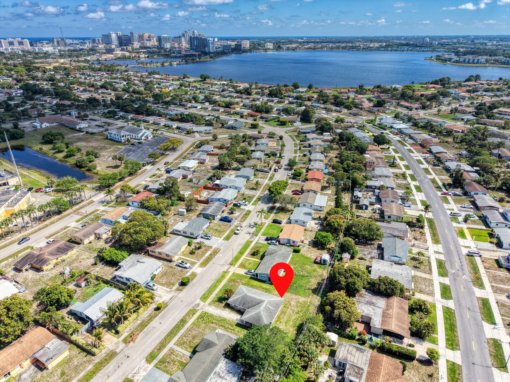 Location! Location! Location! This stunning 3-bedroom, 2-bath home is ready to impress! Perfectly located just minutes from I-95, it offers the ideal blend of comfort and convenience in a peaceful, welcoming community that feels like home from the moment you walk in. Enjoy being just minutes from downtown, the beautiful South Florida beaches, the outlets mall, and amazing restaurants. NO HOA! Fast and easy move-in. Schedule your showing today!