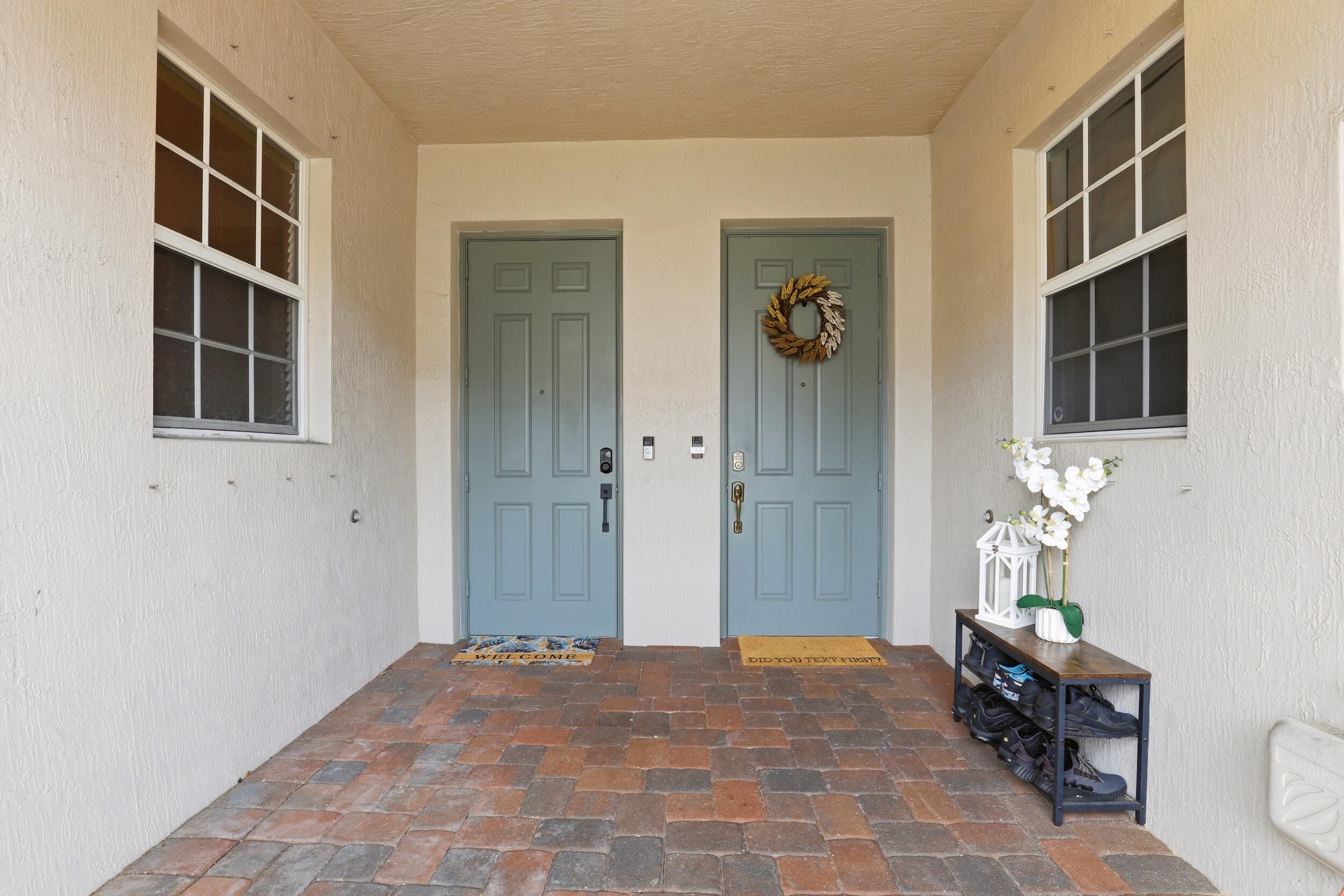 Welcome home to this beautifully remodeled 3-bedroom, 2.5-bath townhouse with a loft, offering over 2,200 square feet of living space and one of the best values in the area. Move-in ready and packed with upgrades, this home features a two-car garage, dedicated laundry room, brand-new 2026 roof, newer appliances, and a built-in security system for added peace of mind. The spacious, open layout flows seamlessly to a covered patio, perfect for entertaining or relaxing outdoors. Located in a quiet, well-maintained community with a pool and playground, you'll enjoy convenient access to major highways, shopping, dining, parks, and South Florida's beautiful beaches. Spacious, updated, and compe