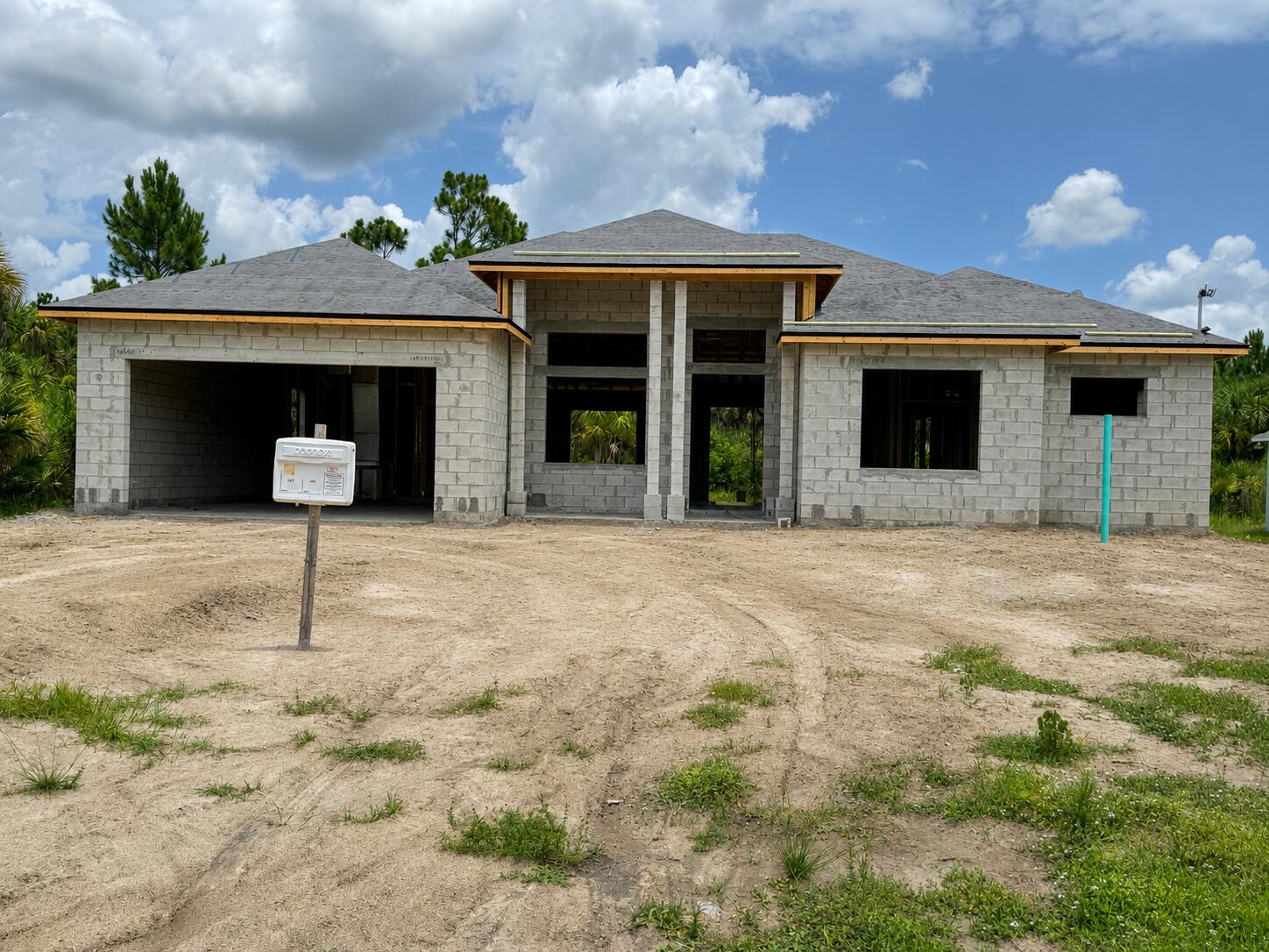 Under Construction. Welcome to this brand-new single-family home currently under construction in the growing Southwest Palm Bay area. Designed with approximately 2,237 square feet of living space and 3,045 total square feet, this home is planned to offer 3 bedrooms, 3 full bathrooms, & a Flex Space that can be used as a 4th Bedroom. A 2-car garage, and an open-concept floor plan. Planned features include impact-rated windows and doors, energy-efficient HVAC, a covered lanai, and 10-foot ceilings in select areas. Situated on a well and septic system with no HOA, this property offers convenient access to schools, shopping, dining, parks, and major roadways. Building permits have been approved and construction is underway. Estimated completion is approximately One months, subject to construction progress and permitting. Photos and renderings, if provided, are for illustrative purposes only. Final finishes, colors, materials, specifications, dimensions, and features are subject to change without notice. Buyer to independently verify all information deemed important.