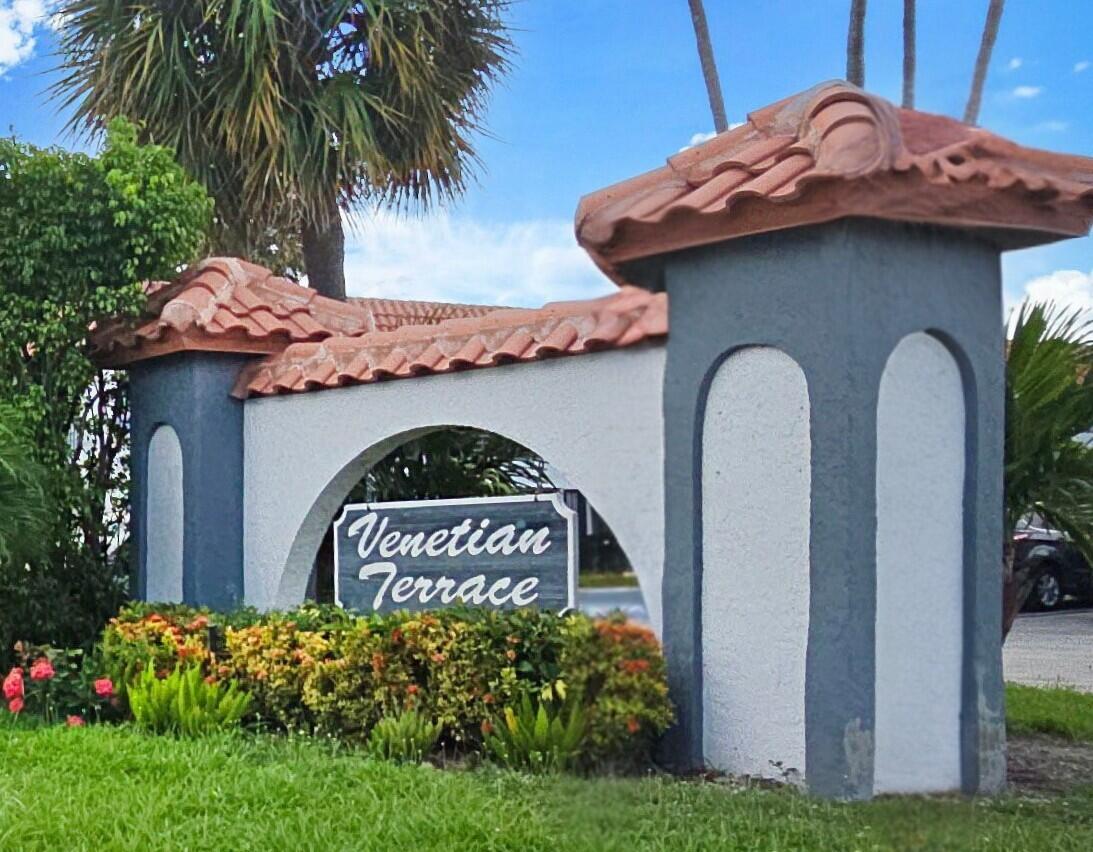 Welcome to this beautifully updated 2-bedroom, 2-bath 1st floor corner unit condo in the pet-friendly, all-age community of Venetian Terrace! Move-in ready and designed with modern elegance, this home features a stunning kitchen with white shaker cabinets, stainless steel appliances, granite countertops, and a gorgeous granite waterfall island that serves as the centerpiece for both cooking and entertaining.  Large-format porcelain tile flooring flows seamlessly throughout the living areas and extends to the screened patio, where you can relax and enjoy peaceful water views. Both bathrooms have been tastefully renovated with a sophisticated, spa-inspired design. The spacious primary ensuite features a walk-in shower with natural stone flooring and stylish stainless steel and brass fixtures, while the guest bathroom offers the same elegant finishes along with a soaking tub—the perfect place to unwind after a long day. Full size stackable washer and drying in the unit is not only convenient but also efficient. New 2024 roof and extra community storage all for comfortable living.   Venetian Terrace is a welcoming, family-friendly community that is both pet-friendly and open to all ages. Ideally located just minutes from shopping, dining, entertainment, beautiful beaches, and I-95, this home offers the perfect combination of comfort, convenience, and Florida lifestyle. Don't miss this opportunity to own a waterfront home in one of the area's most desirable communities in Boynton Beach!