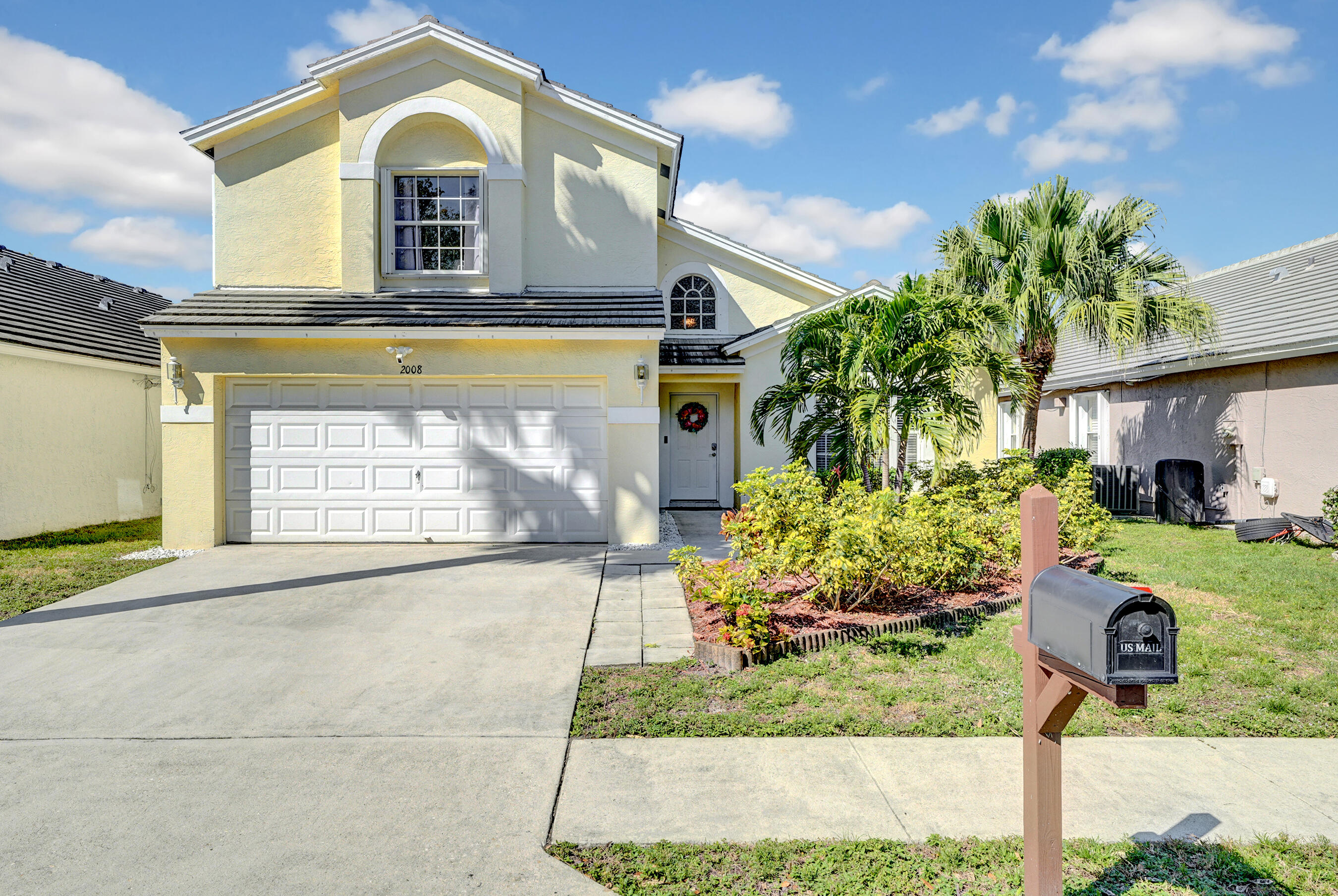 Beautiful two-story home in a gated West Palm Beach community with low HOA fees that include front landscaping. The home features a renovated kitchen, open living areas, and great natural light. Recent updates include a new dishwasher, new washing machine, new exterior AC unit, and a re-screened patio and new interior paint.  Accordion shutters on the second floor provide added storm protection. Seller will pay for NEW ROOF at closing.  The primary suite includes two large walk-in closets. Enjoy the screened patio and backyard for outdoor dining and relaxation. Access available to 3 community pools.   Convenient location near shopping, restaurants, Downtown West Palm Beach, Palm Beach Outlets, and Palm Beach International Airport