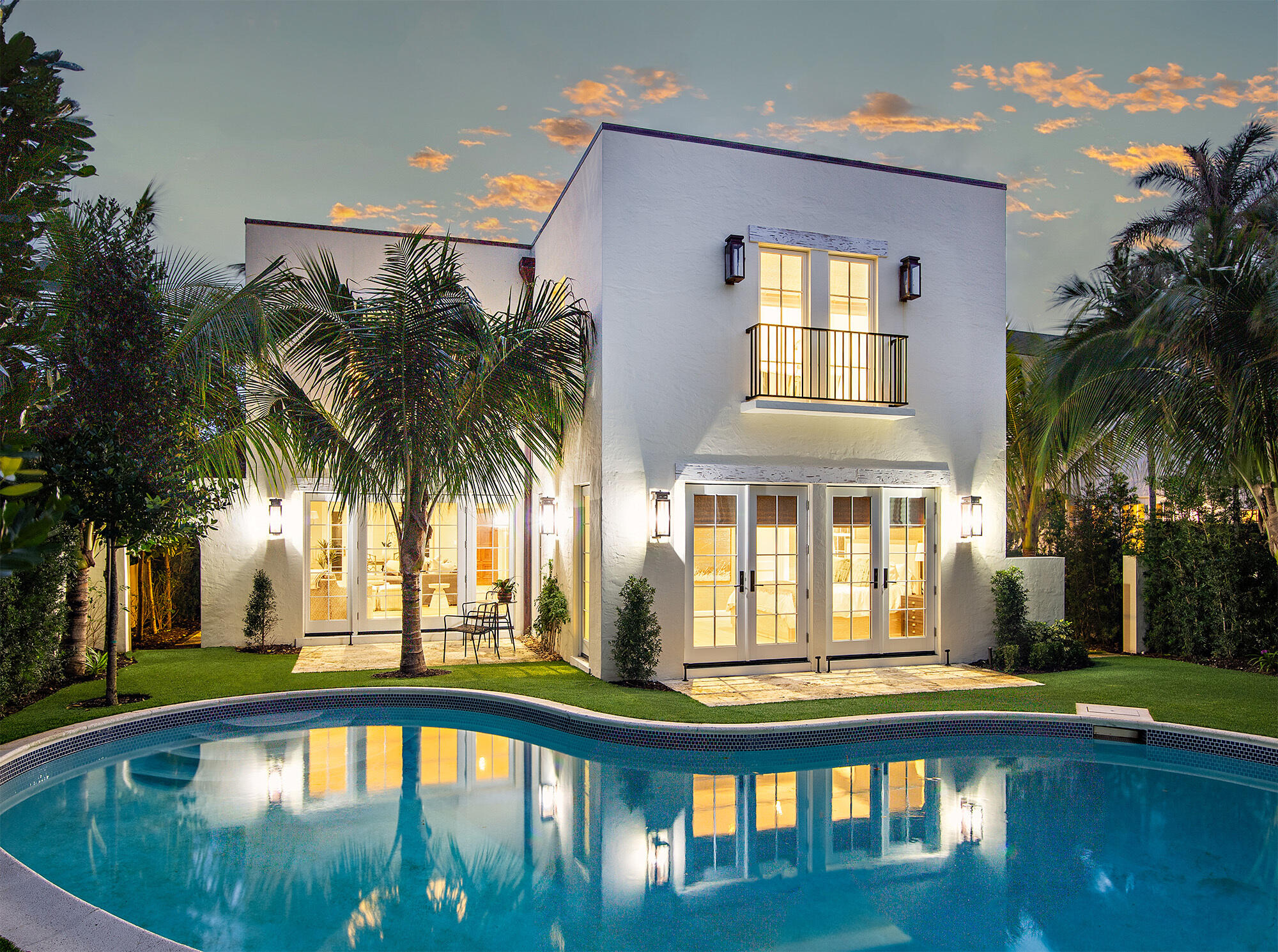 215 Seaspray Avenue, a Mediterranean jewel built in 1928, has undergone a meticulous full restoration, resulting in a total of 2,645 square feet of exquisite living space with 4 bedrooms and 5 and a half baths. Immerse yourself in the architectural splendor reimagined by the renowned Smith Kellogg Architecture and SMI Landscape Architecture firms. Every detail has been considered, from hurricane impact doors and windows to the designer wall coverings that grace the interior. Step into a culinary haven with a kitchen adorned with custom cabinets and top-of-the-line Wolf and Sub-Zero appliances and Franz and Waterworks fixtures. The allure extends to the bathrooms, featuring imported mystery white slabs and custom vanities. The thoughtful redesign includes new flooring, doors, hardware, trim, insulation, and lighting throughout, ensuring a seamless blend of historic charm and modern convenience.
The commitment to excellence is further evident in the exterior enhancements, including hardscape, gutters, and drainage systems. The home is conveniently located in town near the best restaurants and shopping Palm Beach has to offer. Membership to the Sea Street Association is available for exclusive beach access.