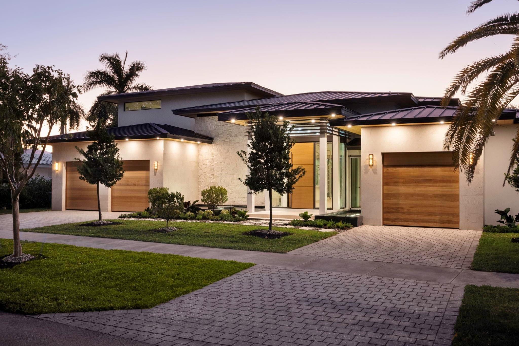 NEW CONSTRUCTION in distinguished OLD CORAL RIDGE! This exquisite 5BR/7BA estate graces a magnificent 12,000sf lot, embodying sophisticated warmth. Serene water features welcome you as the grand foyer unveils spectacular living spaces with bespoke kitchen, refined great room, seamless indoor/outdoor dining/living, glass walls & soaring ceilings. Main-floor primary retreat features spa-like bath & meticulously appointed showroom closets. Expansive loft offers versatile possibilities. Resort-style heated pool/spa & Beach entry creates an unparalleled sanctuary. Curated natural stones, bespoke finishes, reflect impeccable taste. Generous butler's pantry & laundry, 3-car garage, loads of storage & mature landscaping complete this refined haven. Moments to Bayview Elementary, the Park and Beach