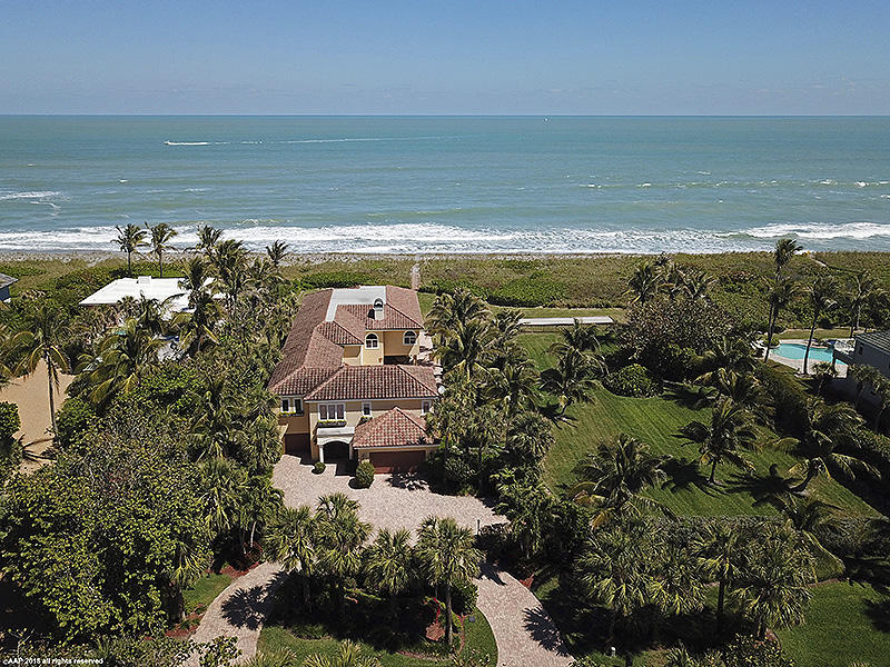 DIRECT OCEANFRONT, Custom 2-story! Enjoy the SAND & TURQUOISE SEAS right here ~~ This fine home features a spacious Master Suite & split-plan bedroom design, 4 Guest Bedrooms (2 Masters possible with a few changes). Chef's Kitchen opens to large Living Room with Marble Flooring, Built-Ins, and lovely Fireplace. The home is pre-designed to include an elevator. A 10-seat Home Theater is connected to a sizable Entertainment/Game Room with wet bar and beverage cooler. The ground level of the home opens to a Patio surrounding the Pool and Spa; plus a huge covered patio which functions perfectly for gatherings for family & friends. Full cabana bath, built-in BBQ, Wet Bar and a nearby Beach Dune Walkover. VACANT OCEANFRONT LOT ALSO AVAIL. SEE MLS#         ASKING $2.9MM