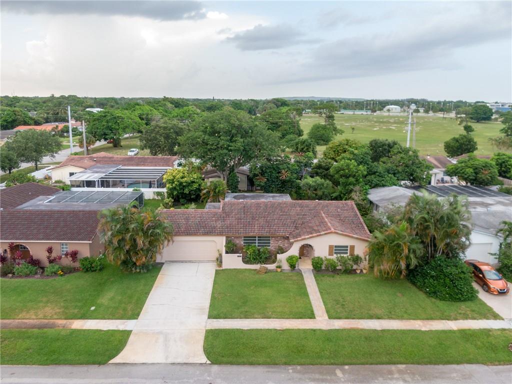 Welcome to SOUTH CREEK - the HIDDEN JEWEL of Broward County!  At 1920 SQUARE FEET, this  OVERSIZED 3 bedroom / 2 Bath has a full-size 2-CAR GARAGE that is holds your vehicles AND all your toys!  FRESHLY PAINTED INSIDE AND OUT with BRAND NEW CARPET and LAMINATE flooring, this house is MOVE-IN READY!  Three LARGE BEDROOMS are stacked with EXPANSIVE LIVING AREAS in the living and family rooms! In addition, there's the BONUS ROOM that can be easily CONVERTED into TWO EXTRA BEDROOMS or turned into a playroom, office space or customized into the best fit for your family's lifestyle!  You won't find a better buy in a better location anywhere in Broward - this is a must-see!  All offers to be submitted on AS-IS Contracts.  Many thanks . Welcome to SOUTH CREEK - the HIDDEN JEWEL of Broward County!  At 1920 SQUARE FEET, this  OVERSIZED 3 bedroom / 2 Bath has a full-size 2-CAR GARAGE that is holds your vehicles AND all your toys!  FRESHLY PAINTED INSIDE AND OUT with BRAND NEW CARPET and LAMINATE flooring, this house is MOVE-IN READY!  Three LARGE BEDROOMS are stacked with EXPANSIVE LIVING AREAS in the living and family rooms! In addition, there's the BONUS ROOM that can be easily CONVERTED into TWO EXTRA BEDROOMS or turned into a playroom, office space or customized into the best fit for your family's lifestyle!  You won't find a better buy in a better location anywhere in Broward - this is a must-see!