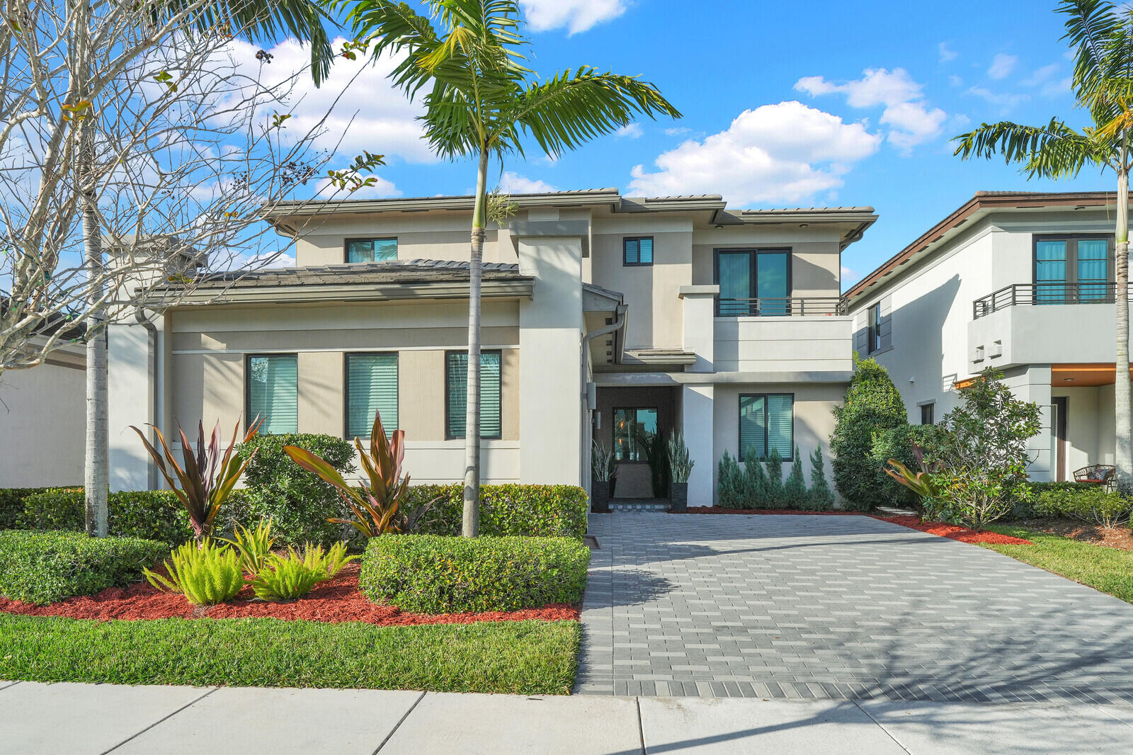 Welcome to this beautifully designed two-story home in the highly sought-after Cascata community of Parkland. This spacious Nile NextGen model features 5 bedrooms, 3.5 bathrooms, a versatile loft/flex space, and a 2-car garage—perfectly designed for today's modern lifestyle. The home offers a private NextGen suite ideal for in-laws, guests, visitors, or live-in support, providing comfort, flexibility, and added privacy. Upstairs, the loft creates the perfect space for a playroom, media area, or home office.   Enjoy separate A/C systems for upstairs and downstairs, enhancing both comfort and energy efficiency. The backyard offers plenty of room to design your dream outdoor space or add a custom pool. Residents of Cascata enjoy an exceptional lifestyle with resort-style amenities including an Olympic-sized pool, water park, state-of-the-art fitness center, indoor basketball courts, tennis courts, and soccer fields. Homeowners also have access to the neighboring MiraLago community, offering an additional resort-style pool, water features, fitness center, and clubhouse with a grand ballroom available for private events. The community is known for its vibrant atmosphere with regular activities and popular food truck nights. Conveniently located near the Sawgrass Expressway, Florida's Turnpike, and Interstate 95, with easy access to shopping, dining, and South Florida's beaches. Zoned for top-rated A+ schools, including a new Charter School 2 minutes away, this home offers the perfect combination of space, location, and lifestyle.