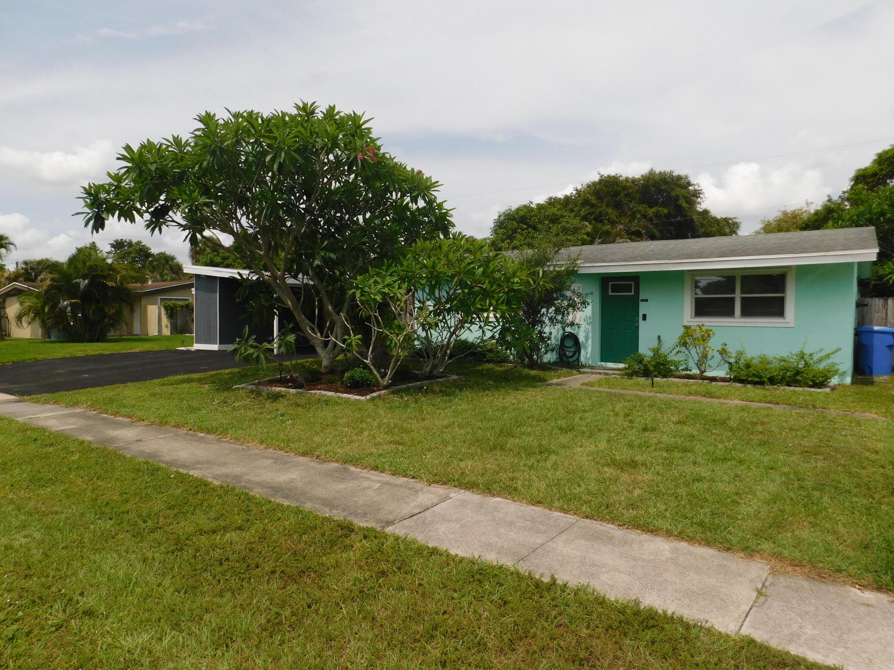 Welcome to this charming three-bedroom, one-bathroom single-family residence nestled in Palm Beach Colony in Royal Palm Beach. This one-story home offers 933 square feet of finished living space, providing an efficient and comfortable layout for everyday living. The practical floor plan makes the most of the available square footage, creating functional spaces throughout the property. Located in an established community, this residence presents an accessible entry point for those seeking a home in the Royal Palm Beach area. This straightforward property offers solid fundamentals for buyers seeking a single-level residence. Close to schools, shops, Restaurants, Baseball Fields and Commons Public Park. New Hurricane front door, renovated kitchen, brand new A/C unit and washer and dryer.