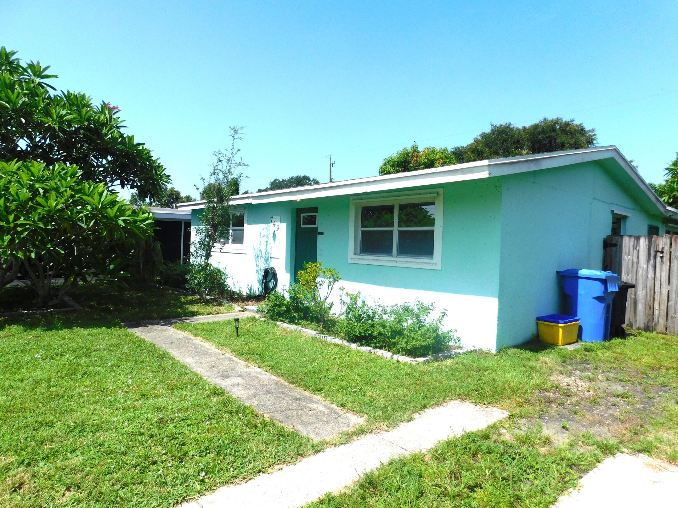 Welcome to this charming three-bedroom, one-bathroom single-family residence nestled in Palm Beach Colony in Royal Palm Beach. This one-story home offers 933 square feet of finished living space, providing an efficient and comfortable layout for everyday living. The practical floor plan makes the most of the available square footage, creating functional spaces throughout the property. Located in an established community, this residence presents an accessible entry point for those seeking a home in the Royal Palm Beach area. This straightforward property offers solid fundamentals for buyers seeking a single-level residence. Close to schools, shops, Restaurants, Baseball Fields and Commons Public Park. New Hurricane front door, renovated kitchen, brand new A/C unit and washer and dryer.