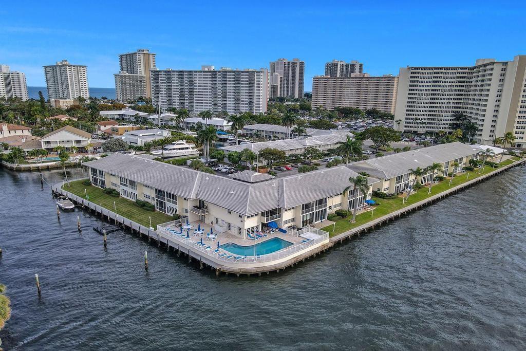 Live like you're on vacation year round! From the second you enter this rarely-available first floor condo, you’ll be greeted by stunning direct Intracoastal & canal views. Surrounded by water, the highly desirable boutique community of Intracoastal Riviera is only a short walk or bike ride to the beach, shopping, restaurants & entertainment. Enjoy the serenity of waterfront living while still having all the attractions of South Florida at your fingertips. The condo features a spacious living area with tile flooring & lots of natural light, a large screened porch, a master bedroom with ensuite, walk-in closet & more. Ready for your personal touches & TLC . Community amenities include a heated pool overlooking the Intracoastal, club room, BBQ area & community dock (daily use only).