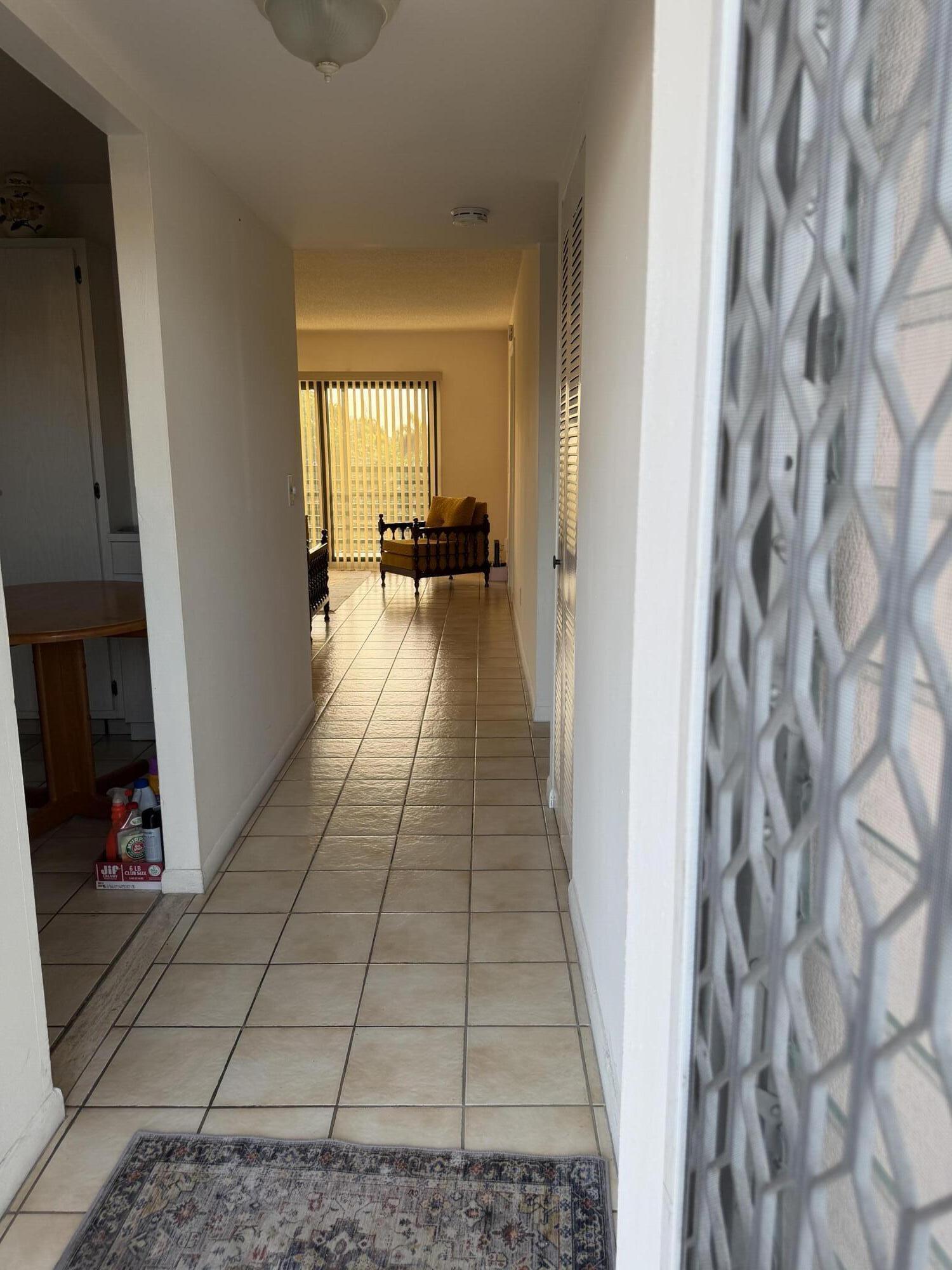 This unit has 2 bedrooms and 11/2 baths. Fully equipped with stove, refrigerator, microwave, dishwasher is reasonably priced for quick sale. Come put your personal touch to make it your forever home. Enjoy the beautiful south florida weather and awesome lake view from your balcony. Unit is located on the 2nd floor. impact sliding doors to the balcony gives extra security. Sellers are VERY motivated. HOA REQUIRES 700 CREDIT SCORE ,$37 MINIMUM INCOME