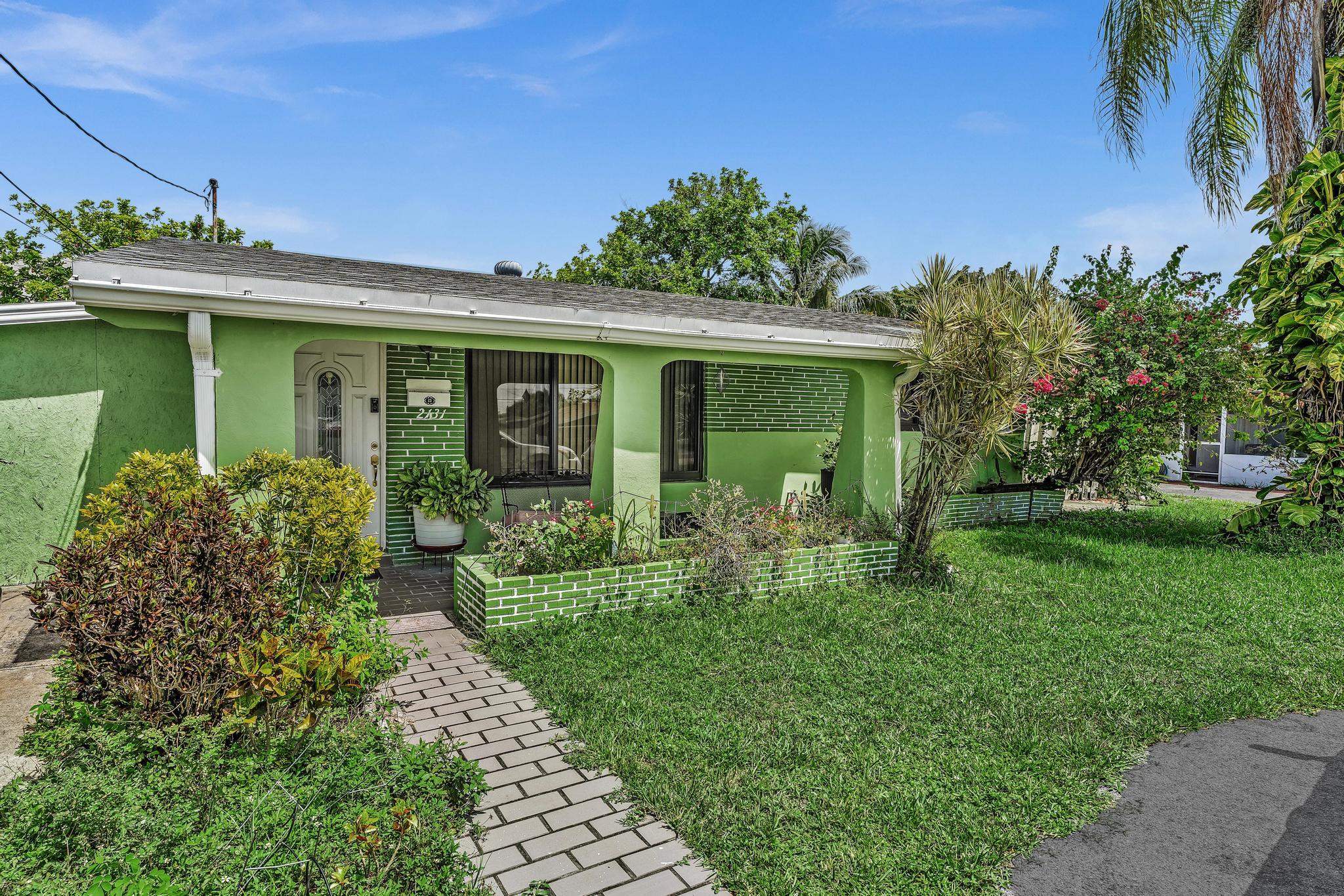 Welcome to your tropical paradise in the heart of Miramar! This beautifully maintained 3-bedroom, 2-bathroom single-family home offers the perfect blend of indoor comfort and outdoor serenity. Step inside to find a bright layout featuring pristine tile flooring throughout, a neutral color palette, and an updated kitchen complete with rich wood cabinetry, granite countertops, and stainless steel appliances. Outside, you will discover an incredible, lush backyard that serves as a private food forest, boasting mature mango, ackee, and pineapple trees alongside a fresh herb garden. The exterior features an expansive circular driveway providing ample parking for guests. No HOA! Perfectly located near local parks, schools, and major highways,this Miramar gem is move-in ready and waiti