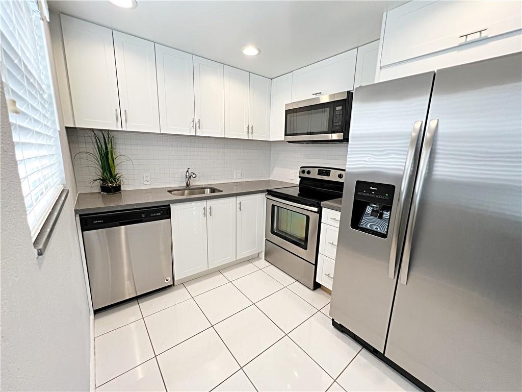 FURNISHED 1ST FL 2BR/1.5BATH CORNER condo w/ a lake view in Boca Raton's beautifully maintained Century Village community. White shaker kitchen cabinets, brand new STAINLESS STEEL appliances, CALCUTTA MARBLE PORCELAIN TILE in shower & bathrooms w/ white shaker vanities & matching quartz counters. NEWLY INSTALLED ELECTRICAL PANEL & PLUMBING. Patio looks out to GORGEOUS VIEW. Parking space in front of condo w/ LOTS OF GUEST PARKING. Pets welcome w/ certified support docs, courtesy buses, indoor/outdoor pools, fitness center w/ tennis courts, billiards room, movies, classes, theater w/ broadway shows, social clubs, close to shopping & house of worship. VERY ACTIVE 55+ lifestyle, very quiet & safe neighborhood, centrally-located, MIN AWAY FROM SHOPPING CENTERS & RESTAURANTS. See BROKER NOTES.
