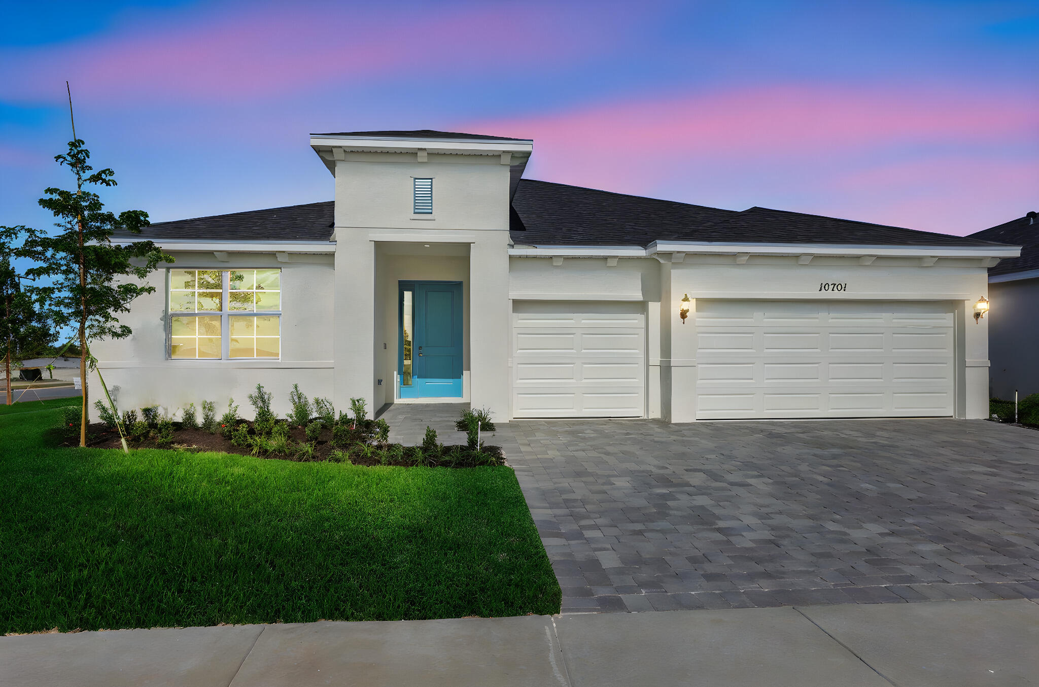 Welcome to The Avalon, a beautifully designed single-story residence offering a bright, open layout with 4 bedrooms, 3 full baths, and a spacious 3-car garage. The heart of the home is a well-appointed kitchen featuring an oversized island that flows effortlessly into the main living and dining areas—ideal for both daily living and hosting guests. Adjacent to the kitchen, a cozy café area provides the perfect spot for casual dining or your morning coffee, while a separate formal dining space near the great room is perfect for entertaining.  The private primary suite includes a generous walk-in closet and an en-suite bath with dual vanities, creating a comfortable retreat. Secondary bedrooms are thoughtfully positioned to provide privacy and flexibility for  guests.  Step outside to enjoy the covered lanai, extending your living space and offering a great setting for outdoor relaxation with stunning sunset views on the lake! Blending style and functionality, The Avalon is thoughtfully crafted to suit today's modern lifestyle.