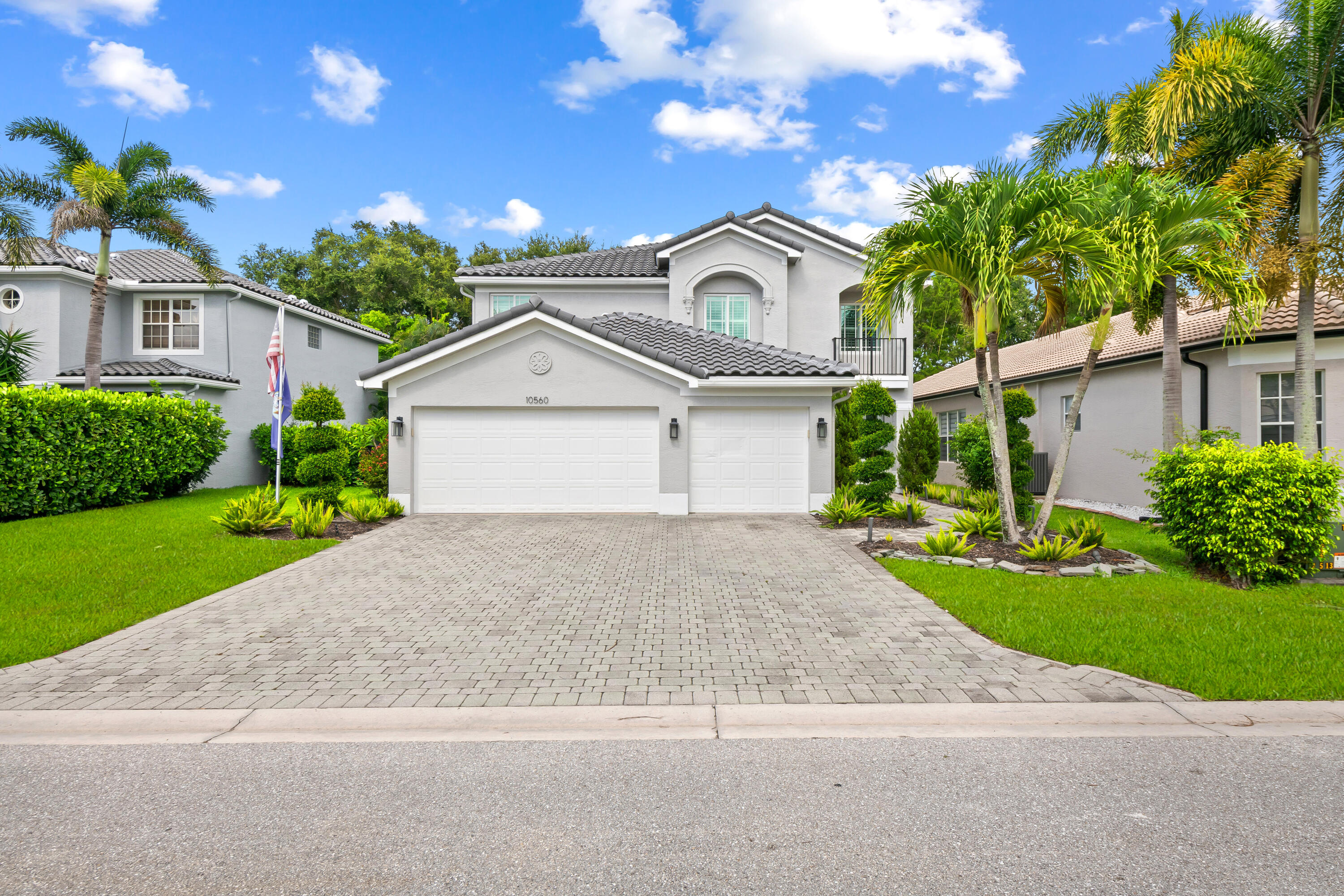 Welcome to the gated community of Canyon Lakes! This beautifully updated 5-bedroom, 3-bathroom pool home sits on an oversized private lot and offers the perfect blend of luxury and functionality. Features include a brand-new roof, fresh exterior paint, impact windows and doors, two newer A/C units, and a modern glass stair railing. The open-concept kitchen boasts quartz countertops, high-end appliances, abundant cabinetry, and a walk-in pantry. The first floor includes a bedroom and versatile flex room. Outdoors, enjoy a heated pool with sun shelf, waterfall, spa, travertine patio, and summer kitchen. The spacious primary suite features a sitting area ideal for an office or nursery, a custom walk-in closet, dual vanities, soaking tub, and separate shower. A rare find in Canyon Lakes.