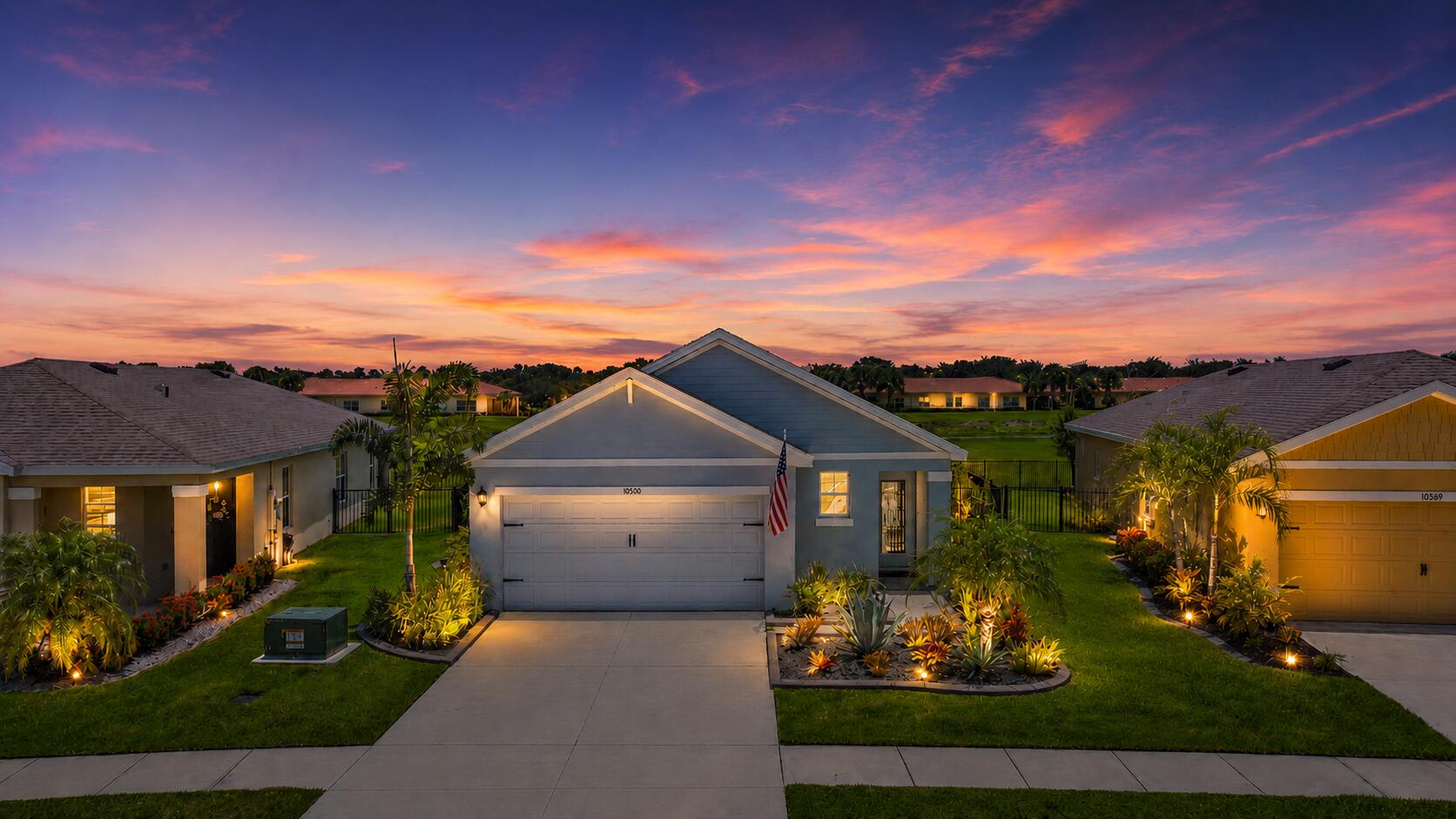 Experience refined living in this impeccably upgraded 2022 D.R. Horton-built residence offering 3 bedrooms and 2 bathrooms. Designed with timeless style, this home features tile flooring throughout the bedrooms, an elegant kitchen enhanced with upgraded stone feature, a designer backsplash, and a new sink. The open living space is highlighted by a sleek floating electric fireplace media console and designer lighting, creating a sophisticated ambiance. Unwind on the screened lanai with extended pavers overlooking the beautifully landscaped, fully fenced backyard. Ideally located just minutes from Tradition's premier shopping, dining, entertainment, grocery stores, and major highways, this exceptional home blends modern luxury with everyday convenience.