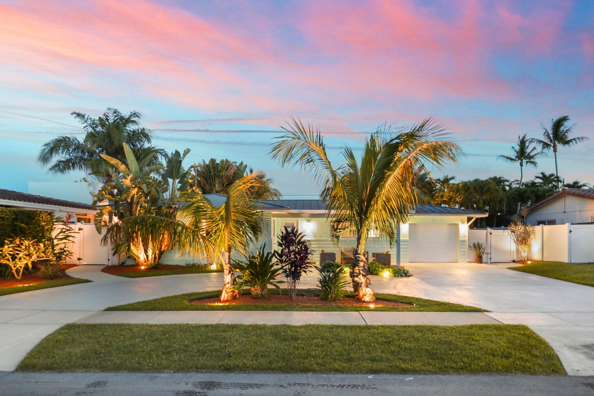 Welcome to Boca Square living at its best. This beautifully updated 3-bedroom, 2-bath home blends style, comfort, and an unbeatable East Boca location. From the moment you arrive, you're greeted by a charming front porch seating area, lush tropical landscaping, and incredible curb appeal highlighted by a metal roof, oversized driveway, and oversized 1-car garage. Inside, the home features impact windows and doors, updated bathrooms, upgraded electrical panel, and a thoughtfully improved interior design. Step outside to your own private tropical retreat — complete with a large resort-style pool, expansive upgraded pool deck, custom lighting, and a stunning tiki hut perfect for entertaining or relaxing year-round. Located in one of Boca Raton's most sought-after neighborhoods, within walking distance to Addison Mizner Elementary and just minutes to Downtown Boca, the beach, and I-95. A rare opportunity to own a move-in ready home with the backyard everyone dreams about.