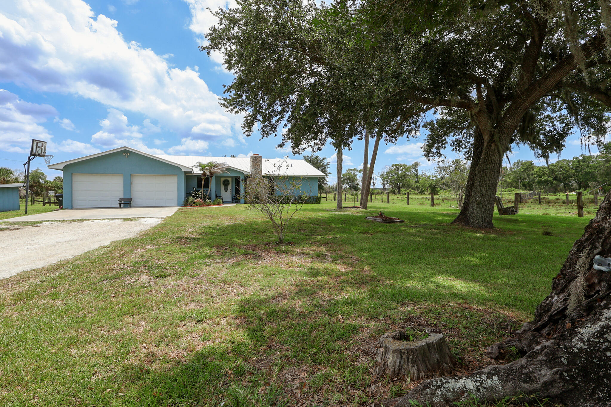 Welcome to this thoughtfully designed single-story residence on Potter Road in Okeechobee, featuring three bedrooms and two full bathrooms with 1,990 square feet of finished living space. The open layout maximizes comfort and functionality throughout the home, offering plenty of room for everyday living and entertaining. A two-car garage provides convenient vehicle storage and additional utility space. This single-family home presents an excellent opportunity for those seeking practical, well-proportioned accommodations in the Okeechobee area.