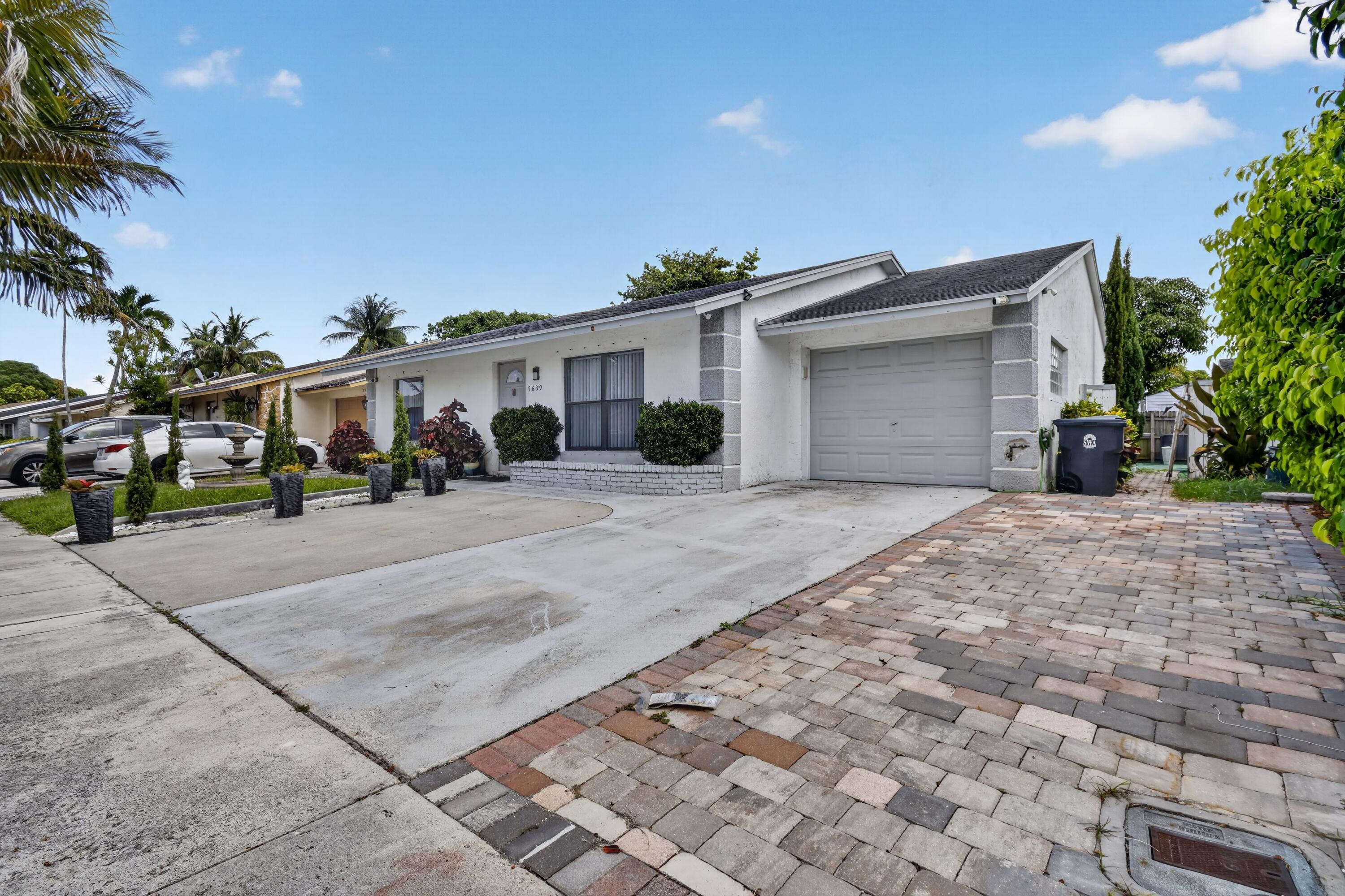 pack your bags and moving into this cozy 4 bedroom 2 bath with large backyard.  Well maintained home with open parking and plenty of yard space to entertain friends.