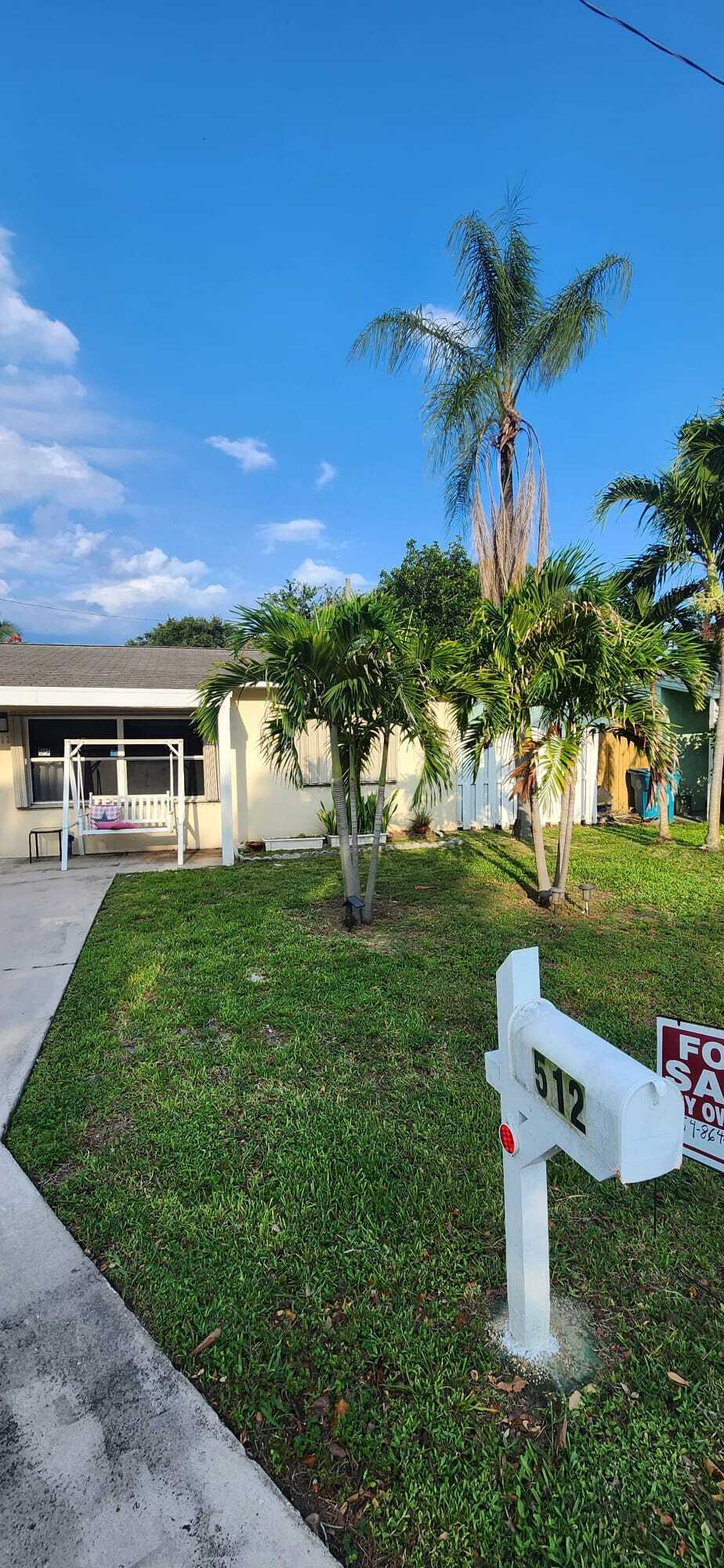 Location! location! location!  Cozy 2 Bed/1 Bath plus bonus room! just 1 mile from the beach and minutes to beautiful downtown Delray. No HOA! this home is sold as is and has so much potential! Tile and new laminate floor throughout. washer and dryer, screened patio, shed, Fenced in yard with room for pool. the carport was converted into a bedroom that connects to an additional room and laundry area and has its own private entrance, this space offers excellent rental income potential. This home in centrally located close to the b4each, parks, shopping and just minutes from I-95.