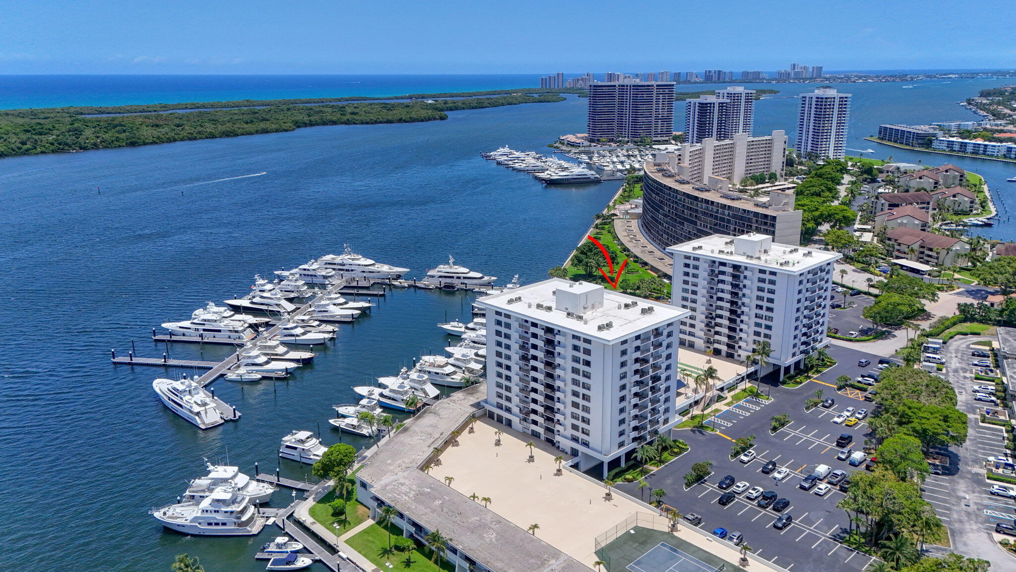 The largest and most coveted condo floorplan in Old Port Cove! This rare unit has an extra half bathroom and a versatile, bonus library that can be converted into a third bedroom or home office. The thoughtfully designed split floorplan maximizes space and privacy for each suite. The renovated kitchen includes premium Miele laundry appliances, while the rest of the residence awaits your personal touch. With views of the pool, luxury yachts, and Intracoastal Waterway - here you can enjoy the North Palm Beach million-dollar lifestyle without the million-dollar price tag.