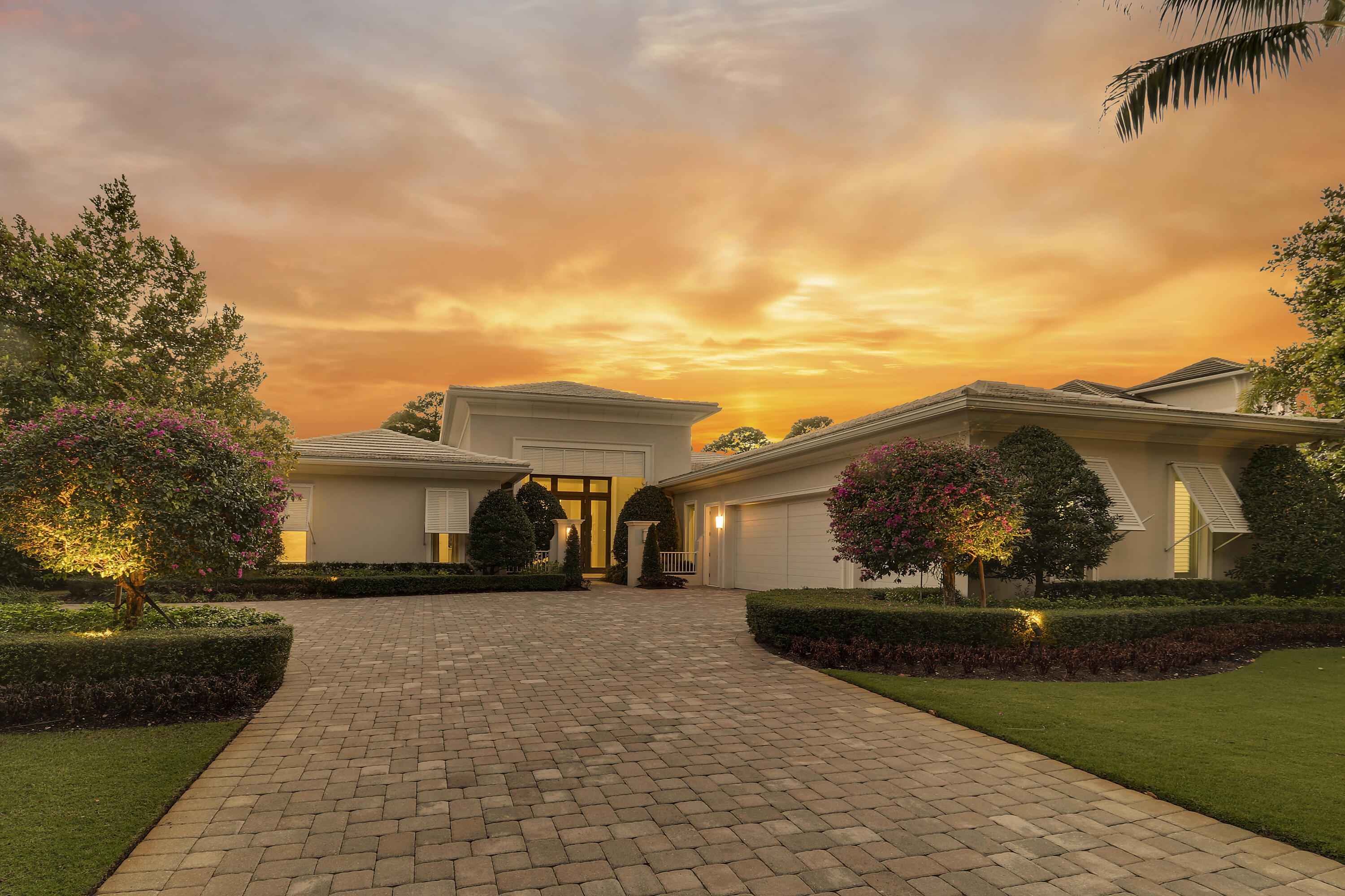 Spectacular 1-story residence by Mustapick Homes on a .39 acre lot featuring 4 full bedroom suites + an office/den, 5.5 baths, epic golf and lake views, 36x36'' Diamond White marble floors, Imported Italian kitchen w/ Thermador appliances, Stormy Sky and Calcutta Quartz counter tops, wet bar, and coffered ceiling heights up to 15'. The primary suite is enormous with a sitting room. Separate his and her baths and closets. Her built-out closet is the size of a guestroom! The outdoor area features a summer kitchen, phantom retractable screens, heated pool & spa, and some of the best views in Old Palm. This gorgeous home is being offered furnished so you begin enjoying this home and the Old Palm right away. This is a rare offering so act quickly and don't miss your opportunity! Additional Features:
Air conditioned garage
European White Oak Floors in the guest suites