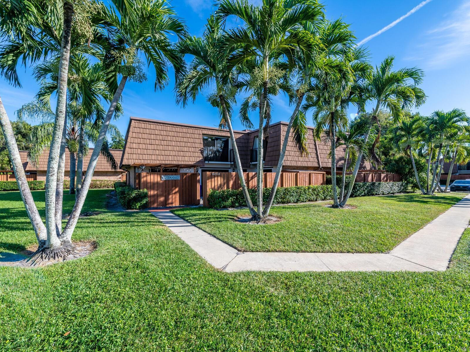 Located in a stunning golf course community with a friendly private country club, this bright 3-bedroom, 2.5-bath corner unit offers beautiful golf course and canal views. The show-stopping centerpiece is the huge custom 18-foot “one-of-a-kind” eat-in kitchen with abundant cabinetry and exceptional space for cooking, dining, and gathering.Grand private patio overlooking the scenic golf course and canal, enjoy the peaceful views.Residents enjoy resort-style amenities including a private country club, golf course, ballroom, party rooms, library, gym, tennis and basketball courts, restaurants, heated pool, picnic areas, playground, and walking trails. Conveniently located near major colleges, highways, Fort Lauderdale Airport, shopping, and public transportation.