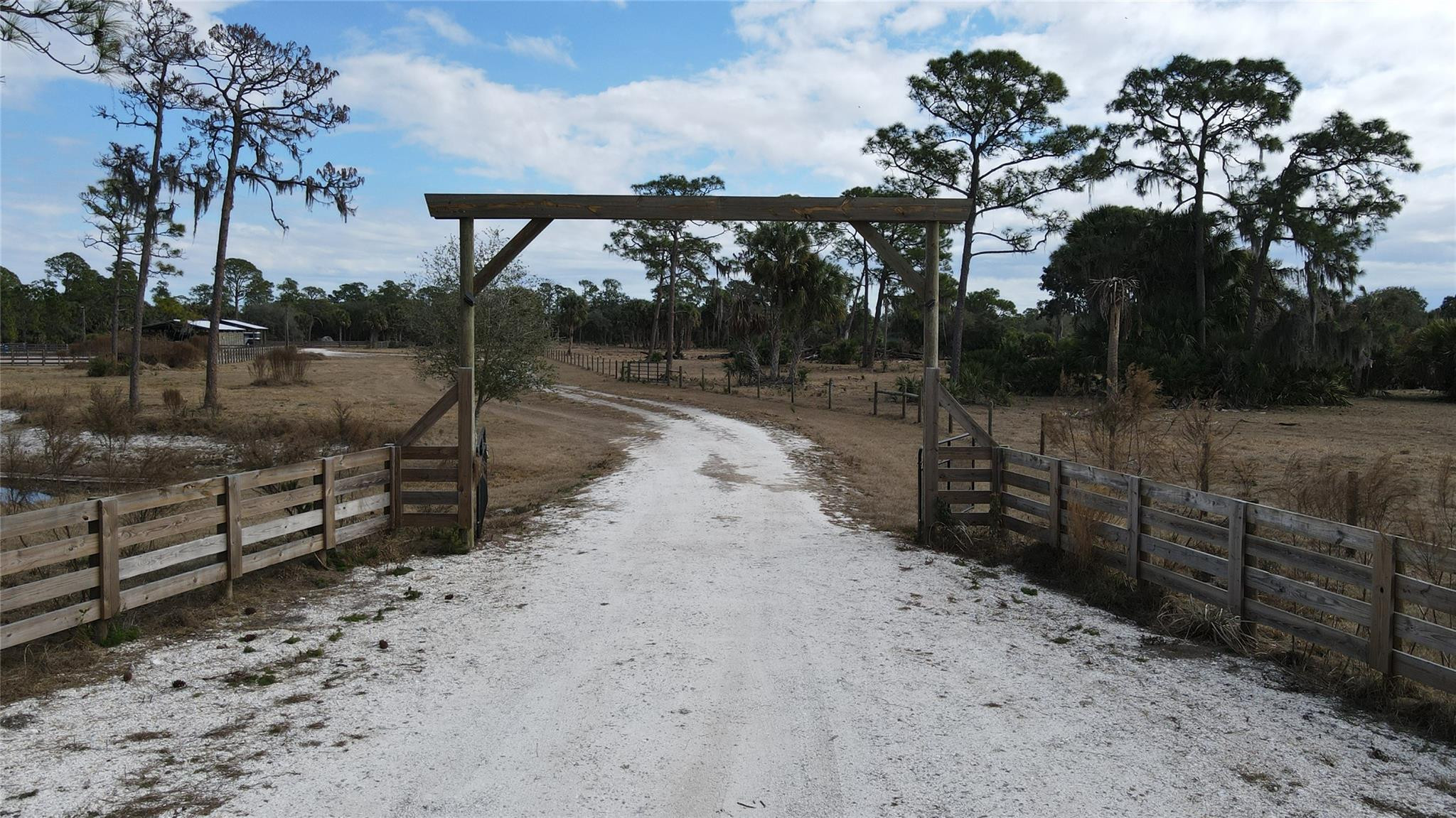 20 beautiful wooded acres improved with:150x120 riding arena with 4 access gates, stadium lighting and water sprinklers. 72X36 Barn with 8 stalls with individual water. 2 insulated rooms and office. Porch area. 36x36 Utility Barn with 2 RV Hookups and water.House pad and driveway installed. 1 year old water well.