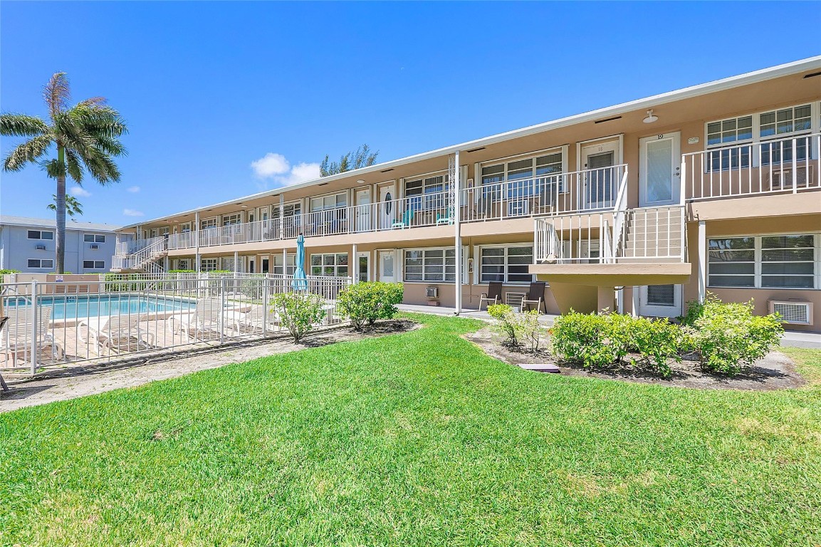 This stunning, fully furnished unit has been tastefully updated with impact windows and doors, exquisite tile flooring, and an open kitchen featuring stainless steel appliances and modern bathroom. The property includes convenient features such as a central vacuum, portable washer, and gorgeous furniture. Access to the complex is through the gated community of Golden Isles, which is surrounded by magnificent waterfront homes worth millions. Enjoy the convenience of walking distance to the beach, restaurants, and entertainment options.