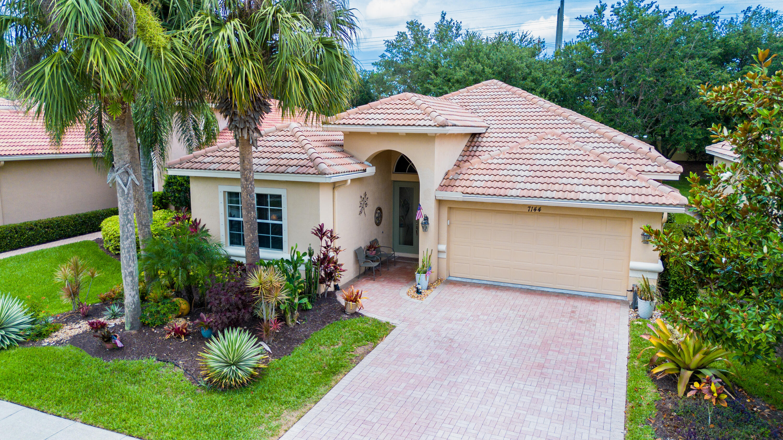 Welcome to this beautiful home located in the highly desirable Maidstone subdivision of PGA Village. This residence offers a spacious kitchen with granite countertops, stainless steel appliances, and plenty of room for cooking and gathering. The oversized master suite features two walk‑in closets and a beautifully updated master bath complete with dual sinks, a separate shower, and a relaxing soaking tub. An open porch provides generous space for entertaining family and friends. Nestled within a private, gated community, this home enjoys access to resort‑style amenities. PGA Village is a golfer's paradise, offering three world‑class PGA golf courses with no mandatory membership, plus access to the exclusive Legacy Golf & Tennis Club. The HOA includes manicured lawn care, mangated security with patrol, extended cable, highspeed internet, common area maintenance, and full access to the Island Clubhouse. The clubhouse features a resortstyle pool, fitness center, tennis and pickleball courts, ballroom, catering kitchen, arts & crafts rooms, billiards room, library, and a full calendar of social activities.

Conveniently located near excellent shopping, dining, the Cleveland Clinic Hospital, top medical facilities, I95, and the New York Mets' Clover Park spring training complex.
This home offers the perfect blend of comfort, luxury, and lifestyle. A MUST SEE!