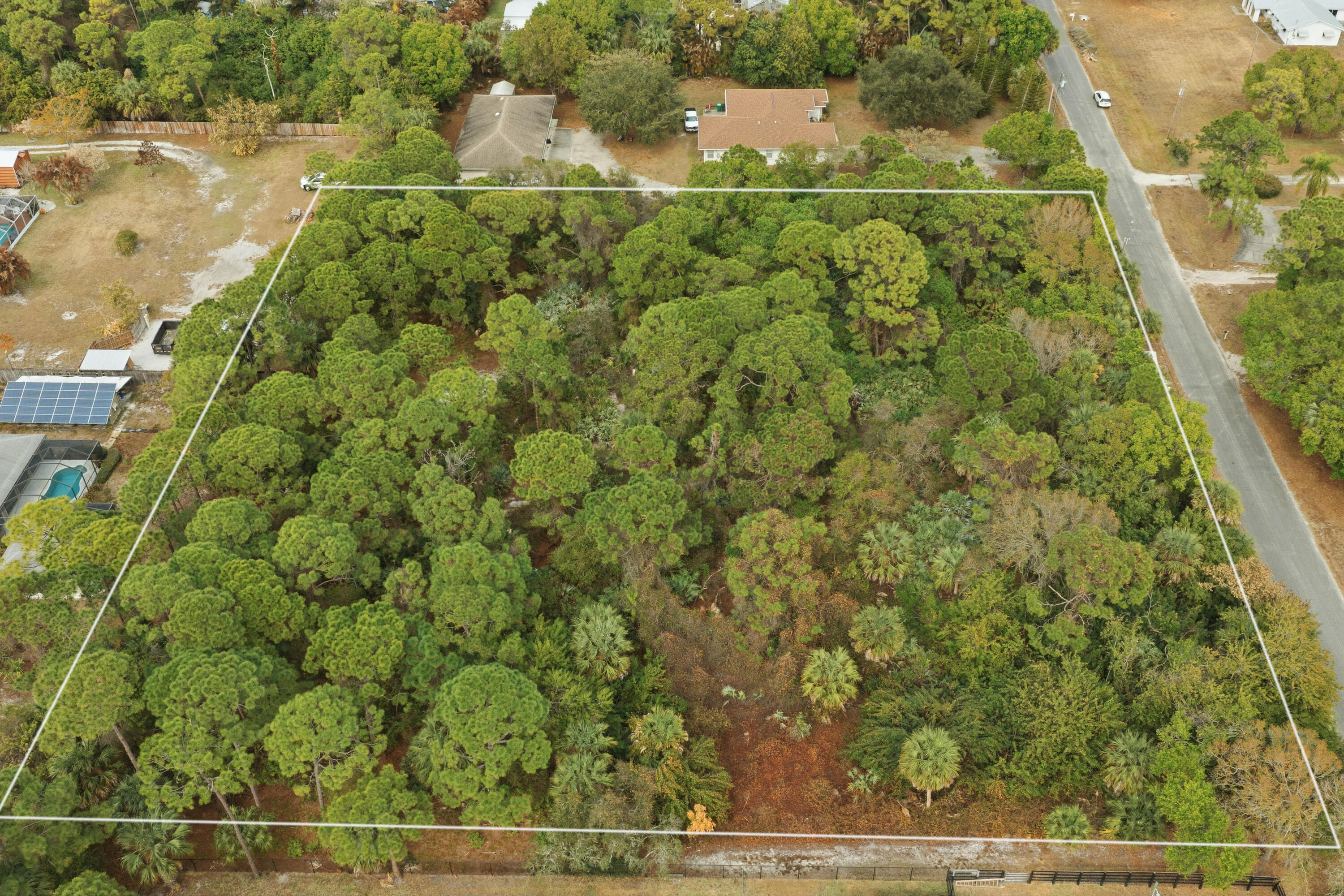 Exceptional opportunity to own a 2.27-acre vacant lot in a prime Fort Pierce location. Boasting approximately 330 feet of frontage, this spacious parcel offers outstanding flexibility for residential development, estate-style living, or future investment. Situated on Pinetree Dr, with east-facing exposure, the property provides privacy while remaining conveniently close to US-1, shopping, schools, and local amenities. A rare find with generous frontage and acreage in an established area. Dimensions are approximate; buyer to verify. Do not miss this unique opportunity to secure a large parcel with endless potential.
