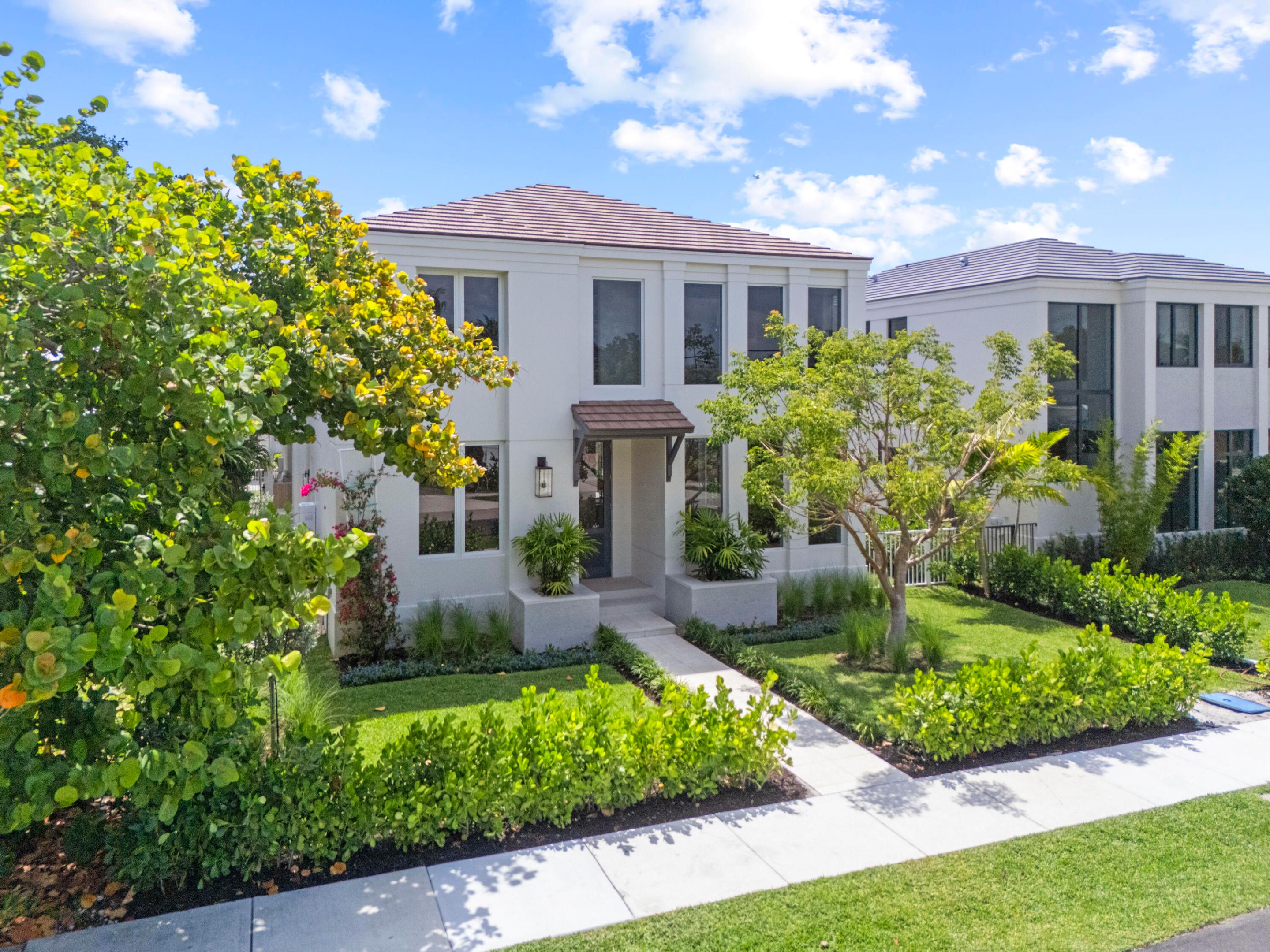 Just moments from Atlantic Avenue (WALK TO EVERYTHING!), this exceptional new construction residence by Gulfstream Builders blends modern luxury with effortless South Florida living. Thoughtfully designed with approximately 3,800 square feet under air, the home offers expansive entertaining spaces, refined finishes, and a seamless indoor-outdoor lifestyle in one of Delray Beach's most desirable locations. The chef's kitchen is outfitted with a premium Thermador appliance package, natural gas range, custom cabinetry, and an open-concept layout designed for both everyday living and entertaining. The home is further enhanced by built-out custom closets, integrated audio wiring throughout the main living areas, primary suite, primary bath, and outdoor spaces. Top of line everything! Just moments from Atlantic Avenue, this exceptional new construction residence blends modern luxury with effortless South Florida living. Thoughtfully designed with approximately 3,800 square feet under air, the home offers expansive entertaining spaces, refined finishes, and a seamless indoor-outdoor lifestyle in one of Delray Beach's most desirable locations.  The chef's kitchen is outfitted with a premium Thermador appliance package, natural gas range, custom cabinetry, and an open-concept layout designed for both everyday living and entertaining. The home is further enhanced by built-out custom closets, integrated audio wiring throughout the main living areas, primary suite, primary bath, and outdoor spaces.  The spacious primary suite offers a true retreat experience with a luxurious spa-inspired bath and custom wardrobe storage. Outdoors, enjoy a private pool, expansive entertaining areas, natural gas grill connection, and lush tropical surroundings. The oversized garage features ceiling heights designed to accommodate automotive lifts and additional vertical storage flexibility.  Additional highlights include natural gas water heater, impact glass throughout,  and a carefully curated blend of comfort, functionality, and elevated design.  Ideally located just minutes from the restaurants, boutiques, nightlife, fitness studios, beaches, and vibrant lifestyle of downtown Delray Beach.