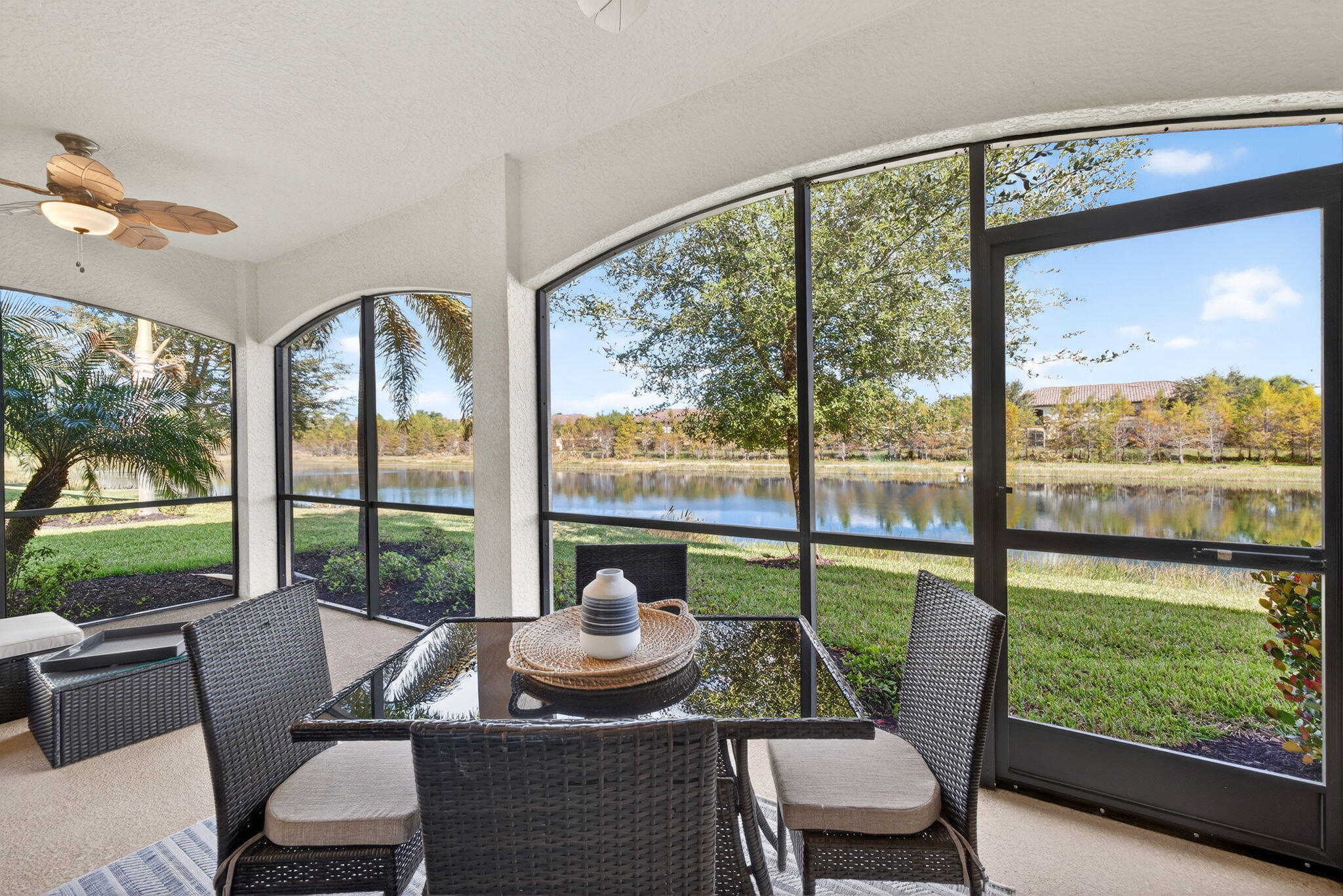 Designed for comfort and entertaining, the open-concept layout features designer finishes and abundant natural light. Enjoy tranquil lake views from the screened lanai. Tuck your car & golf cart in at night in a spacious 2 car garage. All carpets are replaced with Luxury Vinyl Flooring.   Just a short walk to world-class amenities including a lagoon-style pool with waterfall, lap lanes, cabanas, tiki bar and grill, full-service spa, fitness center, sauna, tennis, and more. Minutes to Gulf beaches, RSW Airport, Naples, Fort Myers, and I-75. A rare opportunity in one of Southwest Florida's most sought-after communities.