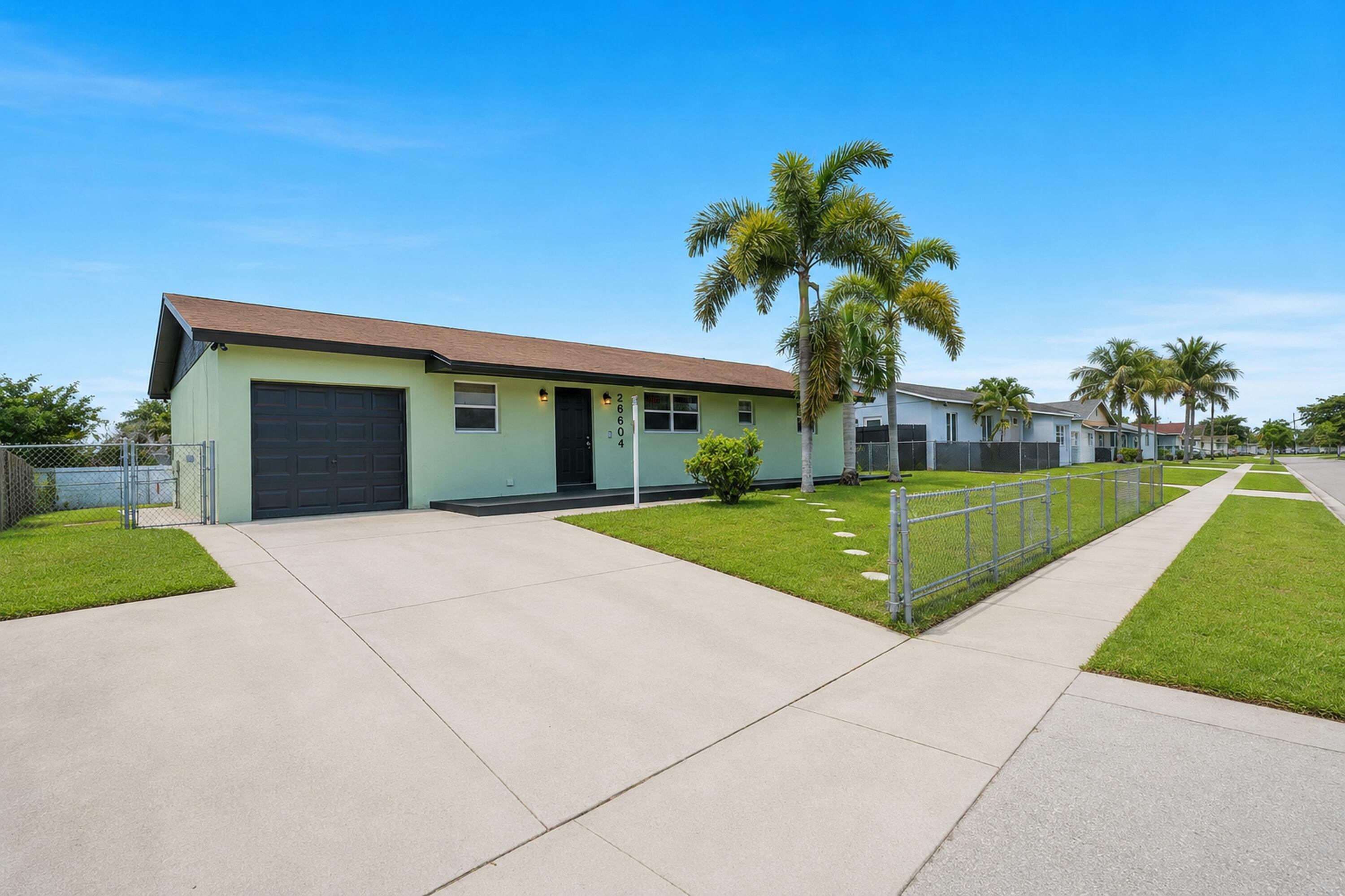 Welcome to this spacious 4-bedroom, 4-bath home offering over 2,200 square feet of versatile living space. Thoughtfully designed for today's lifestyle, this home features a private multigenerational suite complete with its own bedroom, full bath, kitchen, and separate entrance, making it ideal for extended family, guests, or potential rental income opportunities. The main living area offers an open and functional layout with abundant natural light, spacious living and dining areas, and a well-appointed kitchen perfect for everyday living and entertaining. Step outside to a generously sized backyard with plenty of room to relax, entertain, or create your own outdoor oasis. Conveniently located near shopping, dining, schools, parks, and major roadways.