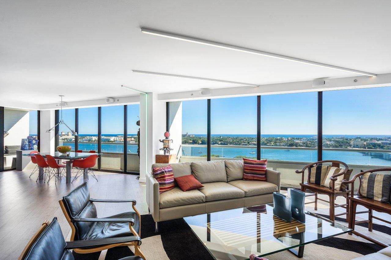Custom renovated double unit + cabana with superlative ocean/intracoastal views in full service white glove condo.  Lives like a house in the sky!  Flexible bedroom spaces include: expansive master suite with two dressing room/closets, art studio, library, family room and more.  Amenities: gracious open living areas, art lighting, open kitchen, great storage, electric blinds, impact doors, two terraces and more.
