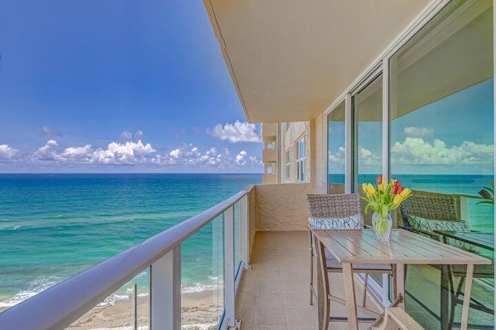 TOTALLY RENOVATED CORNER UNIT STUNNING VIEWS OF THE BLUE ATLANTIC OCEAN AND THE INTER COASTAL WATER WAYS WITH A WRAP AROUND BALCONY WITH THE MOST EXQUISITE SUNSETS YOU WILL EVER SEE. OPEN KITCHEN,WINE COOLER, TOP OF THE LINE APPLIANCES, WASHER AND DRYER IN UNIT.IMPACT FLOOR TO CEILING WINDOWS, PORCELAIN TILE FLOORS, COVERED ASSIGNED PARKING (119) POOL, BBQ AREA, BILLIARD ROOM ,CLUB HOUSE, FITNESS CENTER, LIBRARY,24 HOUR CONCIERGE SERVICE  AND MOST IMPORTANT MILES OF SANDY BEACH AT YOUR FOOTSTEPS.