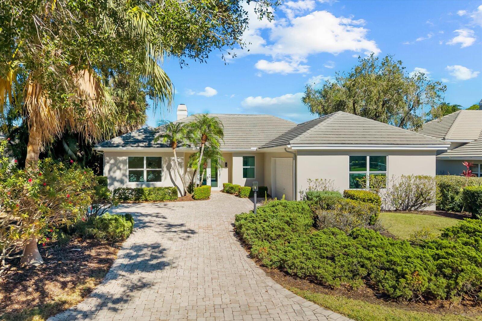 Reimagined and move-in ready, this waterfront home on an oversized lot offers one of the best values and views in PGA Village. Featuring 3 bedrooms, 2.5 baths, and an oversized two-car garage, nearly every detail has been thoughtfully upgraded. Enjoy peace of mind with a new 2022 roof and impact windows and doors, along with a fully redesigned kitchen, custom bathrooms, new flooring, modern lighting, and premium high-end appliances. The spacious primary suite overlooks the golf course and two lakes, while the private backyard offers tranquil water views and a spa-like setting. Perfect as a primary residence, second home, or long-term investment opportunity. This home is in a prime location in one of Port St. Lucie's most sought-after established golf communities.