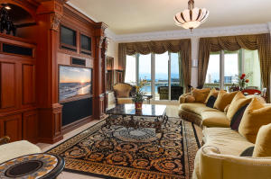 Spectacular condominium now available at the Prestigious Mizner Grand. Private elevator landing opens up to a sprawling 4,827 total sf space offering 3 bedrooms, 4 full baths and 1 half bath.  Breathtaking views of Lake Boca vista can be enjoyed on a balcony directly from the great room and master bedroom. Kitchen includes top of the line appliances and enough space for an additional dining area. Master bedroom features large walk in closet, along with his and her bath.  Mizner Grand offers world class amenities with 2 lakefront pool, club rooms and state of the art fitness center. Steps away from Boca Resort, Mizner Grand appeals to the most discerning of tastes.