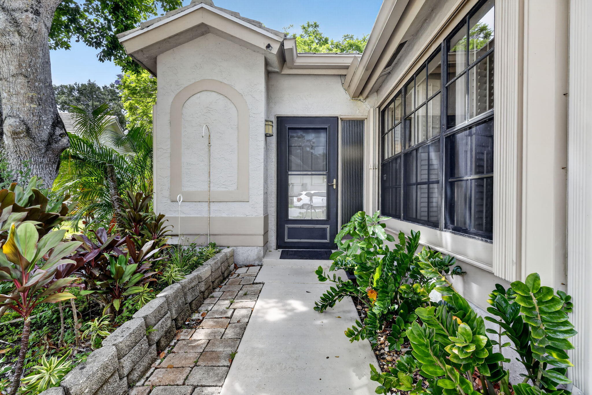 Welcome to this charming 3-bedroom, 2.5-bathroom townhouse located in the Brighton Lakes community of Boynton Beach, Florida. This single-story residence offers 1,665 square feet of finished living space, providing comfortable room for everyday living and entertaining. Beautiful Zen-like backyard. Stainless Steel kitchen appliances. The two-car garage offers convenient parking and additional storage for your vehicles and belongings. This townhouse presents an excellent opportunity for those seeking a well-proportioned residence in an established Boynton Beach community. The community features a clubhouse, pool and tennis court.