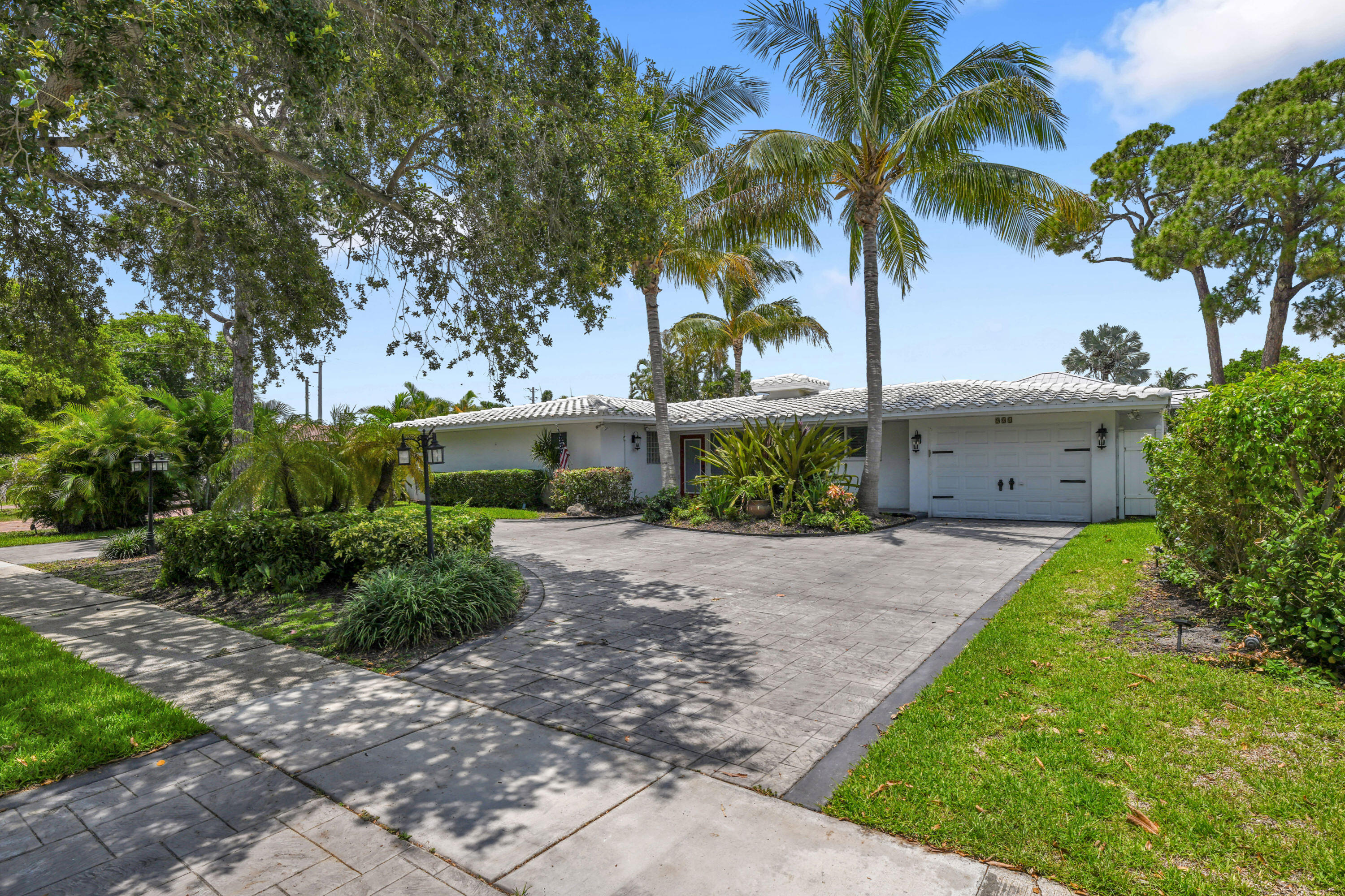 Welcome to this bright and airy 3-bedroom, 2-bathroom residence located in the Cove community of Deerfield Beach, FL. Offering 1,735 square feet of finished living space across a single-story floor plan, this home provides an efficient and comfortable layout for modern living. The residence includes a single-car garage for convenient vehicle storage and parking. This property has a beautiful in ground pool and is conveniently located just minutes to beaches shopping and fine dining. Priced to sell! House sold AS IS.