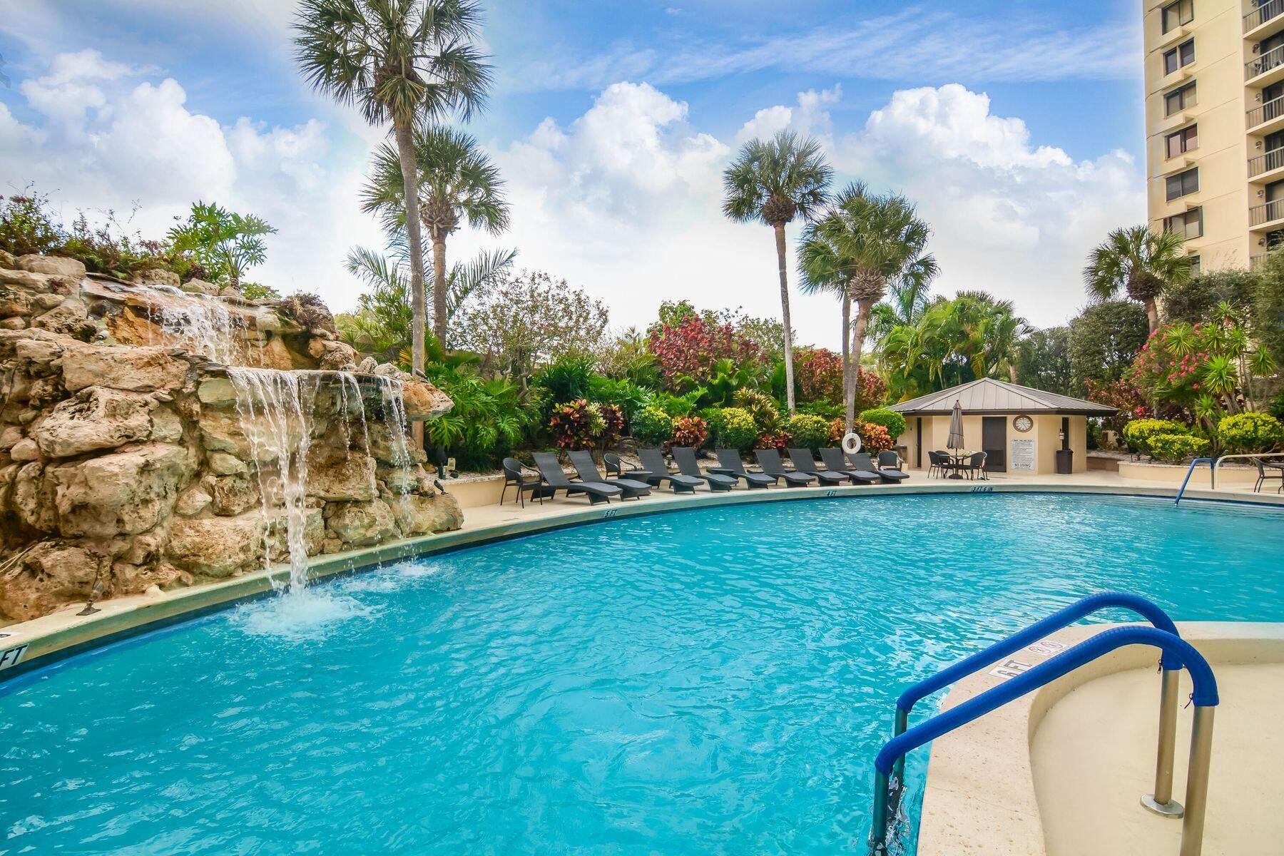 Beautiful 3 bedroom 3 full bath unit with Amazing Panoramic views of Lake Mangonia & Dutchman's Pipe golf course & the City in amenity filled luxury building with 24 hour doorman in prestigious gated community. Magnificent views from the 2 balconies or from any of the 3 Bedrooms day & night. Over 2,300 square feet with new cabinets, granite counter tops, stainless steel appliances & beautiful ceramic floors throughout. Enjoy all the amenities the building has to offer like 24-hr doorman, Gorgeous Pool, Hot Tub, Tennis courts, Shuffle Board, Social Room, Fitness Center, Sauna, Billiard room, Covered Parking, with onsite manager. Personal Laundry room in unit. Great Location near Palm Beach Outlets, Downtown West Palm Beach, Airport, & Beaches. Building has $1.5Million reserves.