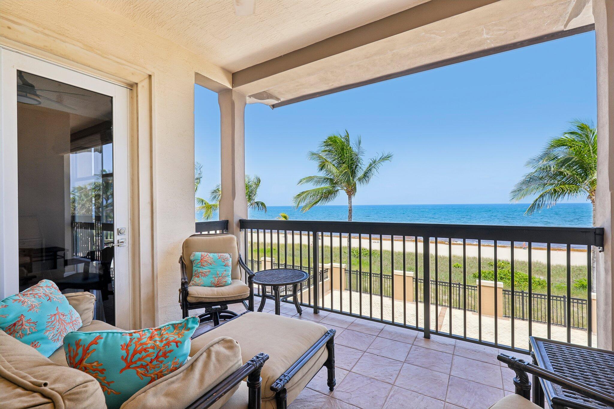 Beautifully furnished 2-bedroom, 2-bath oceanfront residence at Villas By The Sea featuring the desirable Sea Breeze split-bedroom floor plan, 10-foot ceilings, and the building's widest oceanfront balcony. Enjoy beautiful ocean views from every room and an expansive outdoor living space ideal for relaxing or entertaining. This move-in-ready residence also offers an in-unit washer and dryer, two covered garage parking spaces, pet-friendly living, and the convenience of a secure, access-controlled building. Residents enjoy resort-style amenities, including a heated ocean-view pool with private cabanas, a fitness center, and an outdoor kitchen with BBQ grills. Ideally located on the sand and walking distance to Lauderdale-by-the-Sea's restaurants, shops, and entertainment.