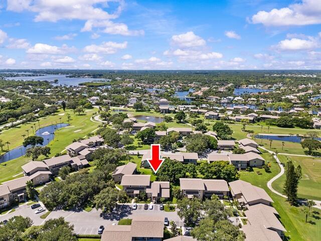 PERFECT TURN-KEY JUPITER CONDO!!   Everything is ready for you!  Say NO to outrageous membership fees!   Enjoy private golf course, heated pool, kayaking on the intracoastal, private tennis and pickleball courts, close to beaches, shopping, dining, and everything.   New A/C, new impact glass, 2 new balconies, new roof, new appliances, new electric shades, and front door too! Two assigned parking places, plenty of guest parking.  Private Storage Unit.   You will love this place every time you come home!