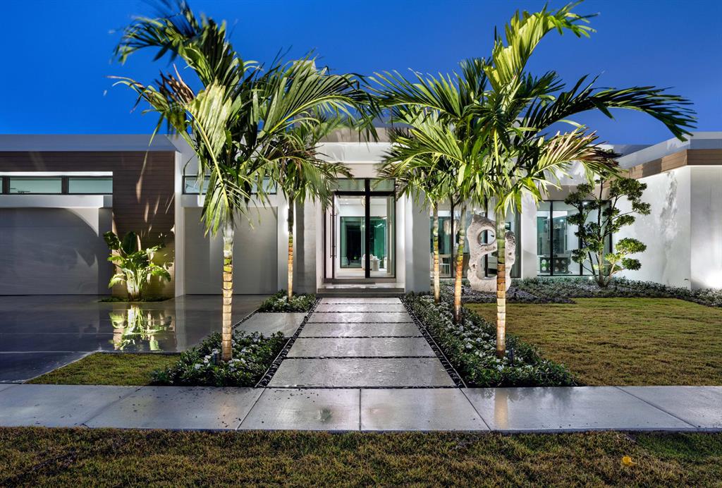 New Midcentury Modern Deepwater Estate... Experience Palm Springs meets Boca Raton in this new striking single-level waterfront estate encased in stone, porcelain, glass, handsome blonde wood and sited on 121± feet of Deepwater by award-winning JSD Builders, architect Gregory Anderson, and interior furnishings by Danielle DePerro. Outdoor entertaining is enjoyed at the expansive lanai with a summer kitchen, cabana, southeast facing resort-style pool with spa and sun shelf. Prime 101± feet of boat dockage. Other amenities include Club room with bar, office/study, and 4-bay garage for the connoisseur.  4-bay garage can be converted to 5th bedroom with bath and closet. 
 Shown by appointment only. DISCLAIMER: Information published or otherwise provided by the listing company and its representatives including but not limited to prices, measurements, square footages, lot sizes, calculations and statistics are deemed reliable but are not guaranteed and are subject to errors, omissions or changes without notice. All such information should be independently verified by any prospective purchaser or seller. Parties should perform their own due diligence to verify such information prior to a sale or listing. Listing company expressly disclaims any warranty or representation regarding such information. Prices published are either list price, sold price, and/or last asking price. The listing company participates in the Multiple Listing Service and IDX. The properties published as listed and sold are not necessarily exclusive to listing company and may be listed or have sold with other members of the Multiple Listing Service. Transactions where listing company represented both buyers and sellers are calculated as two sales. The listing company's marketplace is all of the following: Vero Beach, Town of Orchid, Indian River Shores, Town of Palm Beach, West Palm Beach, Manalapan Beach, Point Manalapan, Hypoluxo Island, Ocean Ridge, Gulf Stream, Delray Beach, Highland Beach, Boca Raton, East Deerfield Beach, Hillsboro Beach, Hillsboro Shores, East Pompano Beach, Lighthouse Point, Sea Ranch Lakes and Fort Lauderdale. Cooperating brokers are advised that in the event of a Buyer default, no financial fees will be paid to a cooperating Broker on the Deposits retained by the Seller. No financial fees are paid to any cooperating broker until title passes or upon actual commencement of a lease. Some affiliations may not be applicable to certain geographic areas. If your property is currently listed with another broker, please disregard any solicitation for services. Copyright 2023 listing company All Rights Reserved.

DISCLAIMER:  Builder and/or Seller reserve the right to make changes and/or modifications to plans, specifications, features, colors and prices.  All plans,  elevation renderings, and videos shown are artists' conceptions and are not to scale.  The information herein is believed to accurate but not guaranteed and may be subject to errors, omissions and changes without notice.  All measurements, dimensions, room sizes and lot sizes are approximate.

Buyer pays title insurance, Florida documentary stamps, and all other closing costs. Taxes are based on vacant land only and subject to change.
