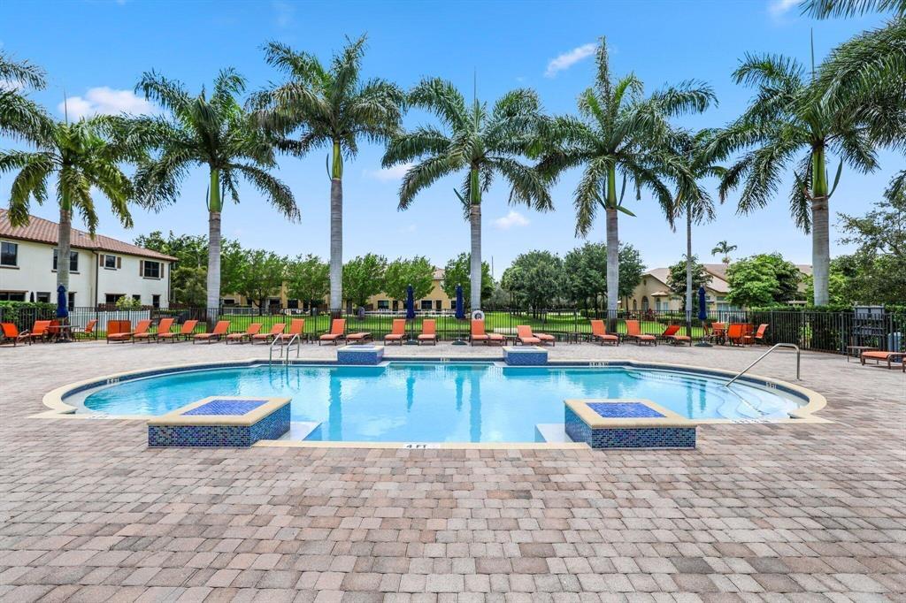 Quaint beautiful boutique community featuring a well maintained three bedroom townhome centrally located in the heart of Davie. Property has newer stainless steel kitchen appliances, as well as a new dryer and water heater. Tile flooring throughout the living area on the first floor and vinyl flooring is on the stairs as well as all the bedrooms and hallways. The split bedrooms floor plan is tastefully laid out with a spacious primary bedroom featuring a walking closet and a grand bathroom. The primary bathroom has a roman tub separate from a roomy shower enclosure and dual sinks. The windows have custom plantation shutters throughout the living areas and blinds in the bedrooms. All the bedrooms have ceiling fans as well as the living room. This home is an absolute turn key opportunity. This gated community which is a gem privately tucked away is well manicured with lush landscaping, clean and very inviting to call home. This is a must see home. Leasing is allowing after two years of ownership.
