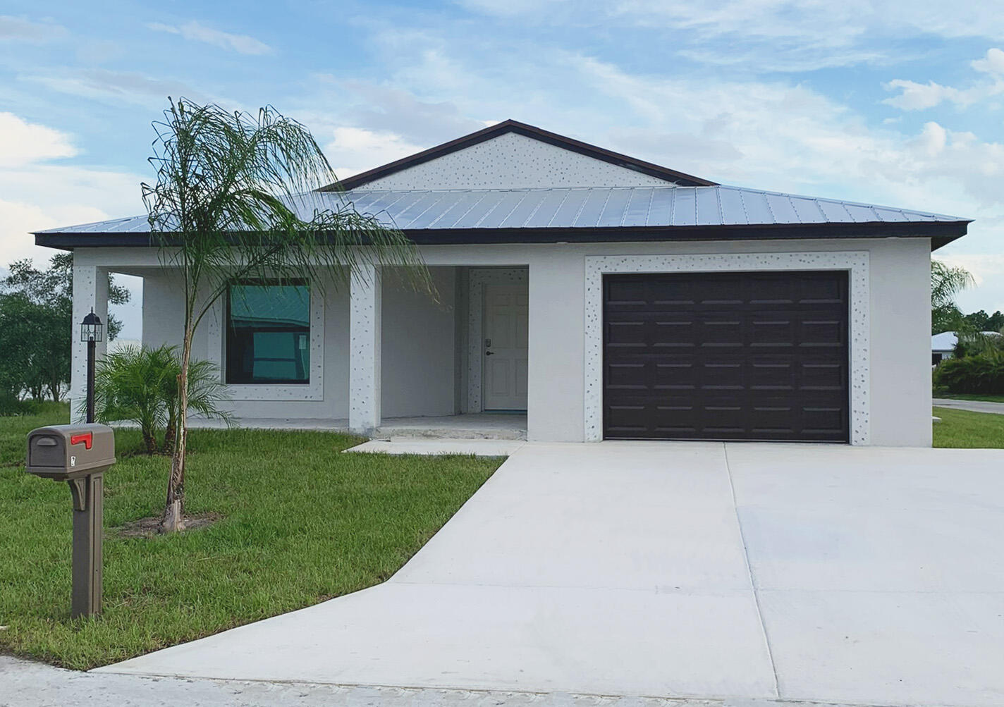 Our newest Model: The Platinum offers incredible value with 2 full bedrooms plus a den, 2 baths, and a 1 car garage. Enjoy high vaulted ceilings, a chef's kitchen with a versatile peninsula, Quartz countertops, open concept and large front and rear porch. Built for comfort and peace of mind with solid block construction and impact windows. All models offer additional value and security with 5/8" true plywood roof sheathing, hurricane tie straps, R-30 insulation, & hip roof designs ensuring big insurance premium discounts plus all our homes are equipped with all energy efficient appliances. Land Lease is $569/mo. and locked in for 99 years. It includes all amenities, trash service & basic lawn maintenance.