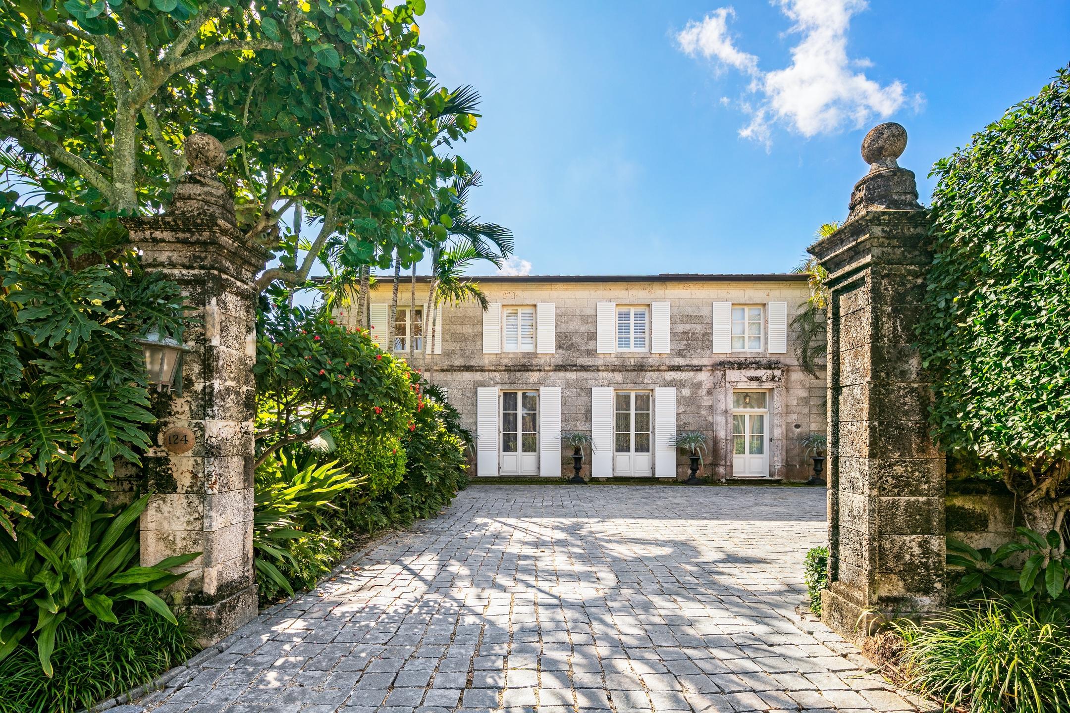 New photos coming next week. Extraordinary late 1920's Palm Beach estate created by Howard Major in a ''Creole'' French Classical design. The stately residence, sitting on a lot of approx. 25,200 sq. ft., is finished with natural rusticated quarried coral blocks originating from Cuba both on the entire exterior as well as several important living areas and trim work on both levels inside the home. See more remarks...