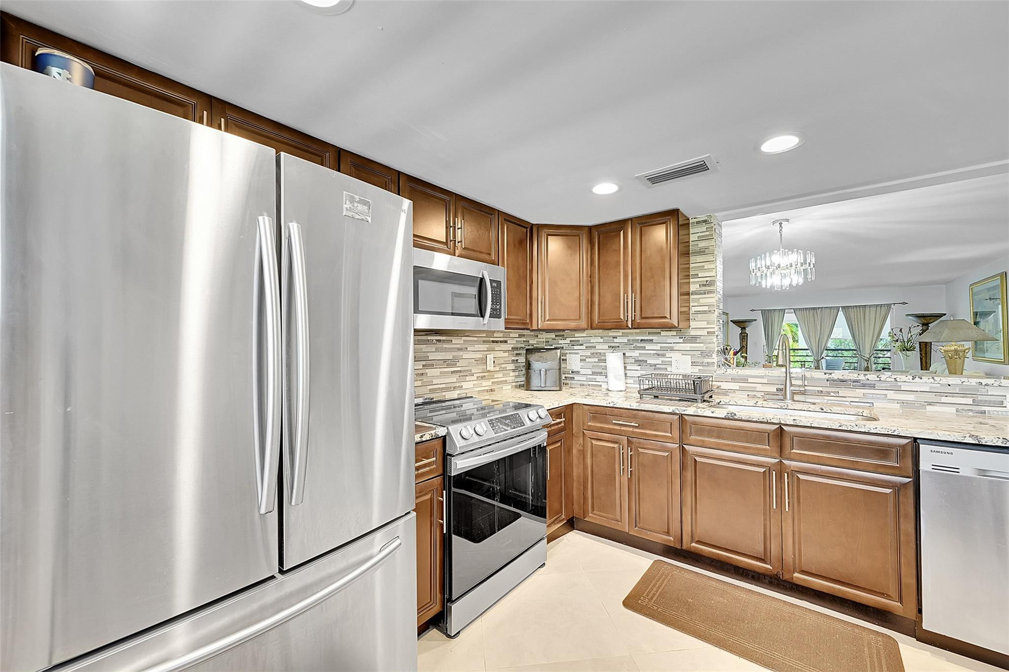 BACK ON THE MARKET!. PROBATE IS OVER!. PERFECT FOR AN INVESTOR!. BEAUTIFUL RENOVATED 2BEDROOM/2BATH. CAN BE RENTED AFTER 1 YEAR. NO CAP. NEWER KITCHEN CABINETS WITH SS APPLIANCES. CERAMIC FLOORS THROUGH-OUT. RENOVATED BATHROOMS. PRIME LOCATION. WALK IN DISTANCE TO THE CLUBHOUSE AND TENNIS COURTS. SMOOTH CEILINGS (NO POPCORN). A/C (APPROX 10 YRS)ASSOC REQUIRES 20% DOWN & 1 OCCUP 55+ VACANT/CLICK ON SHOWING ASSIST