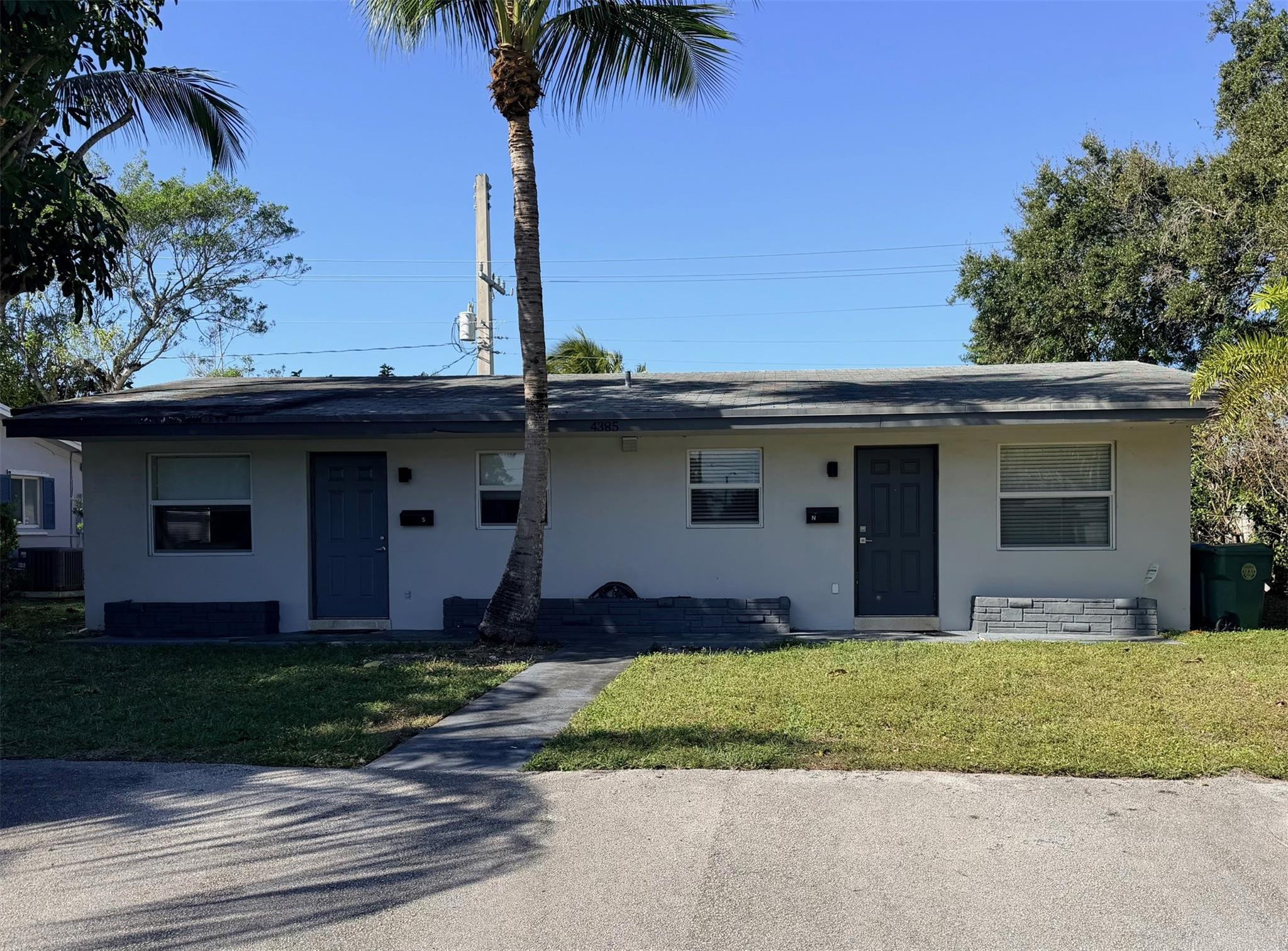 Strong income opportunity in Coral Heights. This duplex features two 1 bed/1 bath units. One unit was updated in 2020 with new appliances, countertops, flooring, A/C units, and in unit laundry. The second unit is ready for renovation to maximize rental potential. Property includes impact windows and doors, four front parking spaces, and spacious backyards with paver patios. Pipes redone in 2025. Excellent location east of Dixie Highway, close to Oakland Park’s Culinary Arts District, Federal Highway shopping and dining, and just ten minutes from the beach. Cash only.