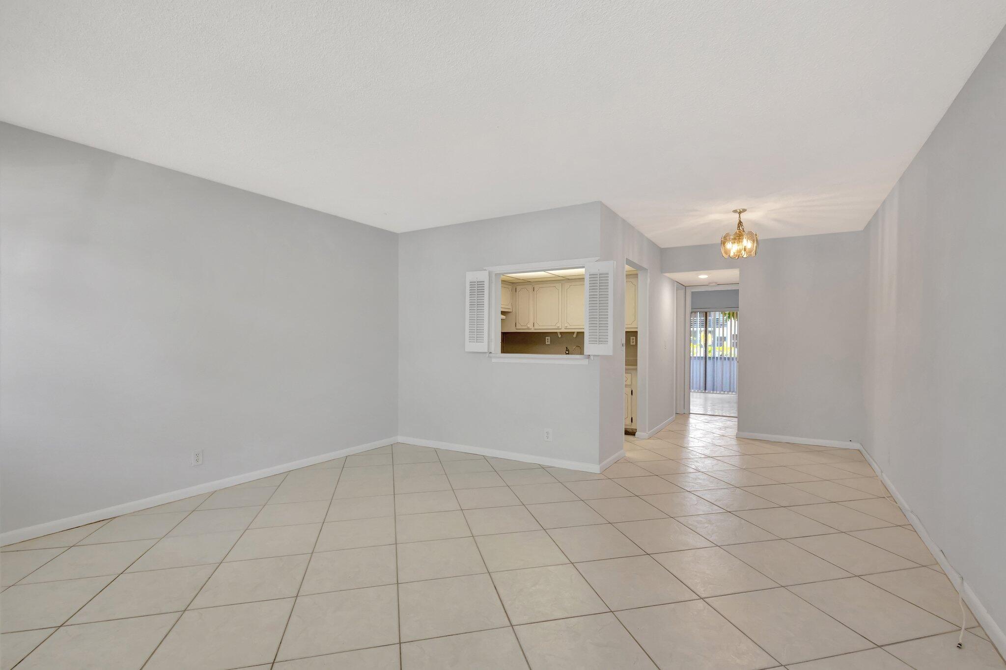 Location, Location, Location. Welcome to this charming 1 Bedroom, 1 Bathroom ground floor condo in the most private & peaceful location in this Gated 55 and older Community. Freshly painted with high-quality Sherwin Williams paint throughout. Enjoy the convenience of tile flooring, new air conditioning and water heater, a walk-in shower, new window treatments, new flat top range. Residents have access to resort-style amenities, including a huge Clubhouse,18 pools, bus service, and a short walk to a nearby place of worship & a short walk to the gym. Live the lifestyle you deserve in this lovely condo. Not many ground floor units available. Book your showing now. Bring offers, the seller is motivated!