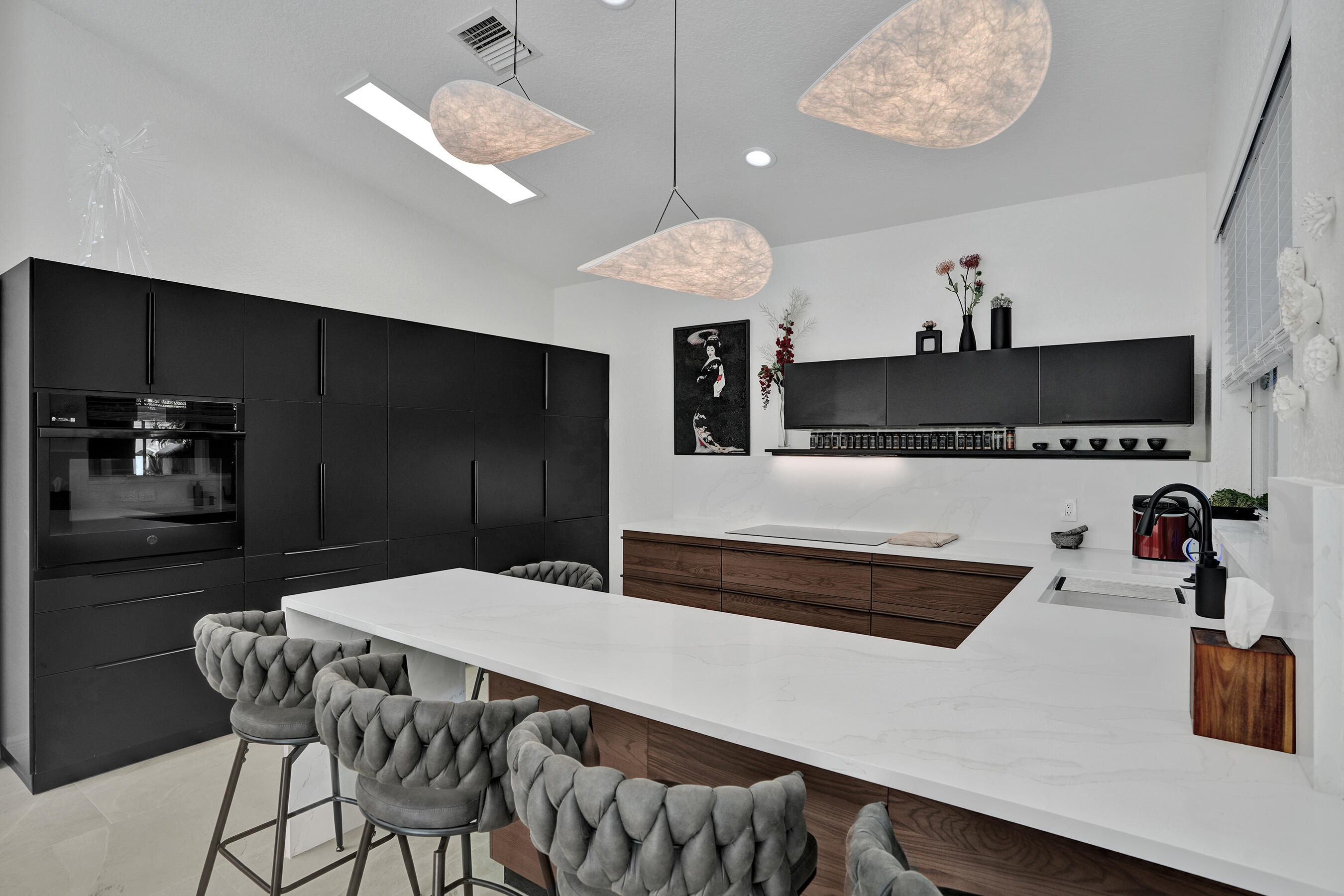 This stunning designer-remodeled 3-bedroom, 2-bath home in the prestigious Heron Bay community is the definition of move-in ready. Featuring a brand-new roof and thoughtfully updated with high-end finishes throughout, every detail has been carefully curated for modern luxury and comfort. Enjoy a gorgeous new kitchen, beautifully renovated home, a newly resurfaced pool, and brand-new travertine decking that creates the perfect outdoor retreat. This exceptional home is truly turnkey! just bring your luggage and start enjoying the South Florida lifestyle! Parkland A+ rated Schools, exceptional family lifestyle, and top-of-the-line club houses and amenities.